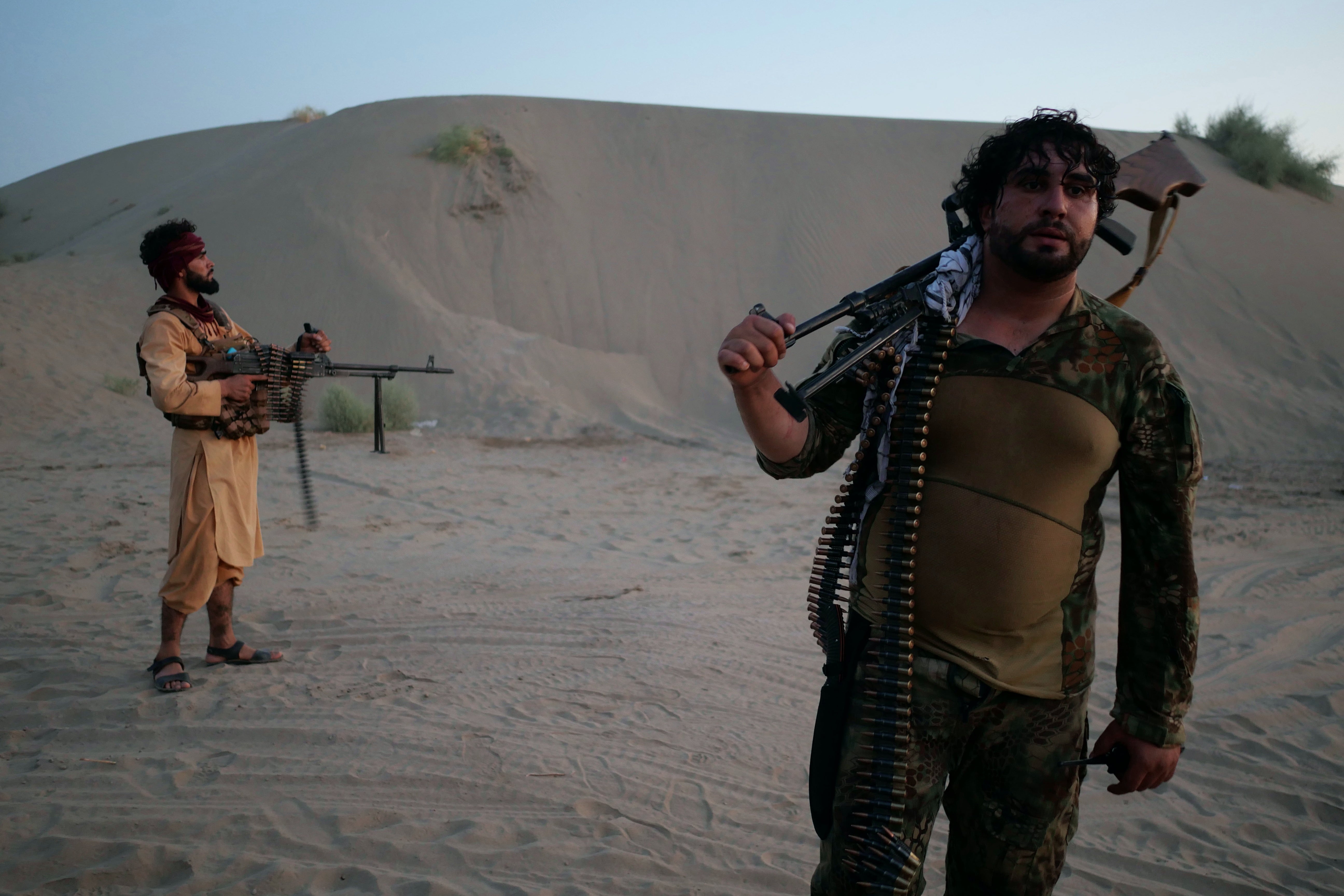 Mohammad Ismaray, 25, is a shopkeeper who has taken up arms as part of Atta Muhammad Noor's militia in the fight against the Taliban in Mazar-e-Sharif, in the north of Afghanistan