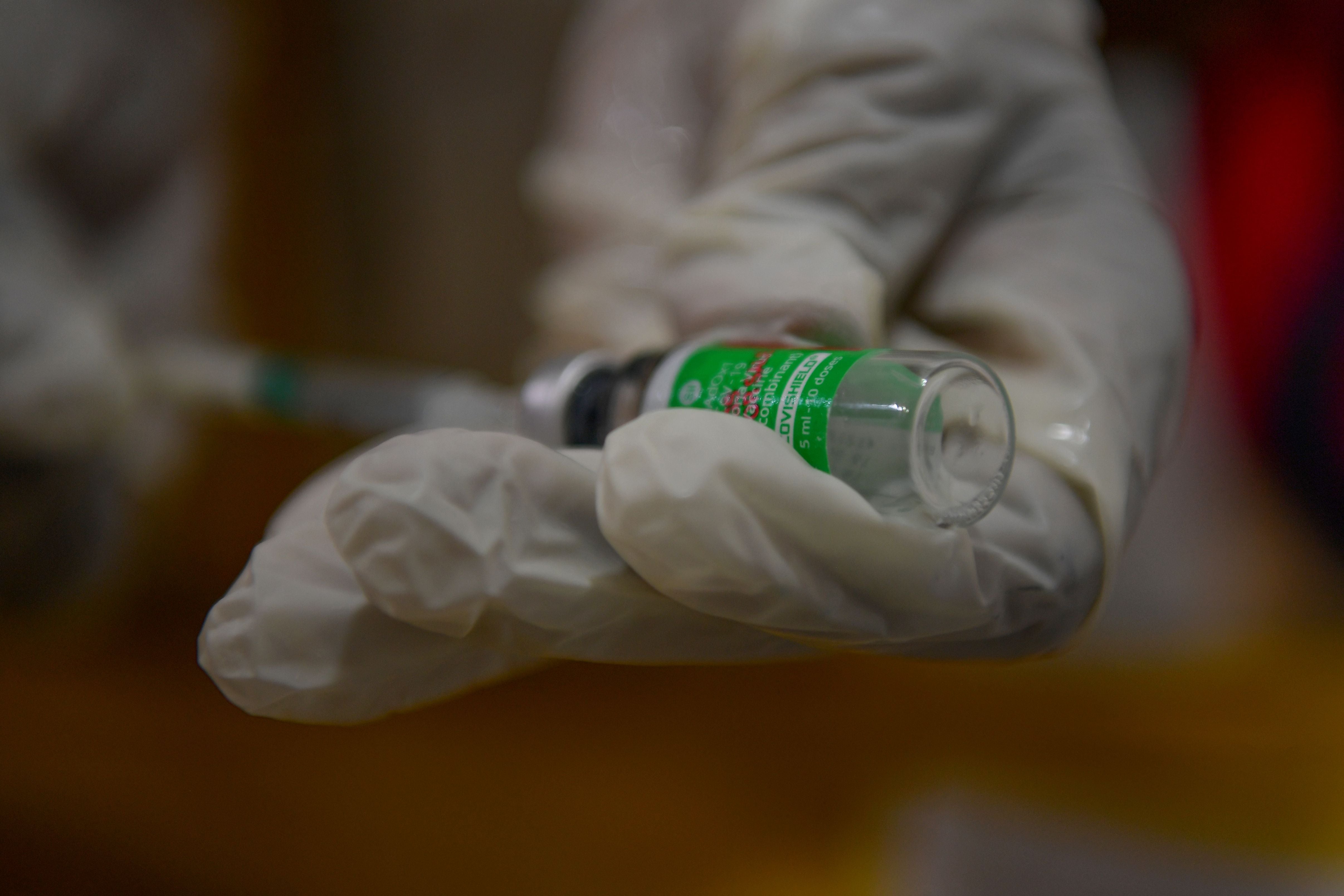 A medical staff prepares a jab of the Covishield, AstraZeneca-Oxford's Covid-19 coronavirus vaccine, during a vaccination drive in Mumbai 12 July , 2021