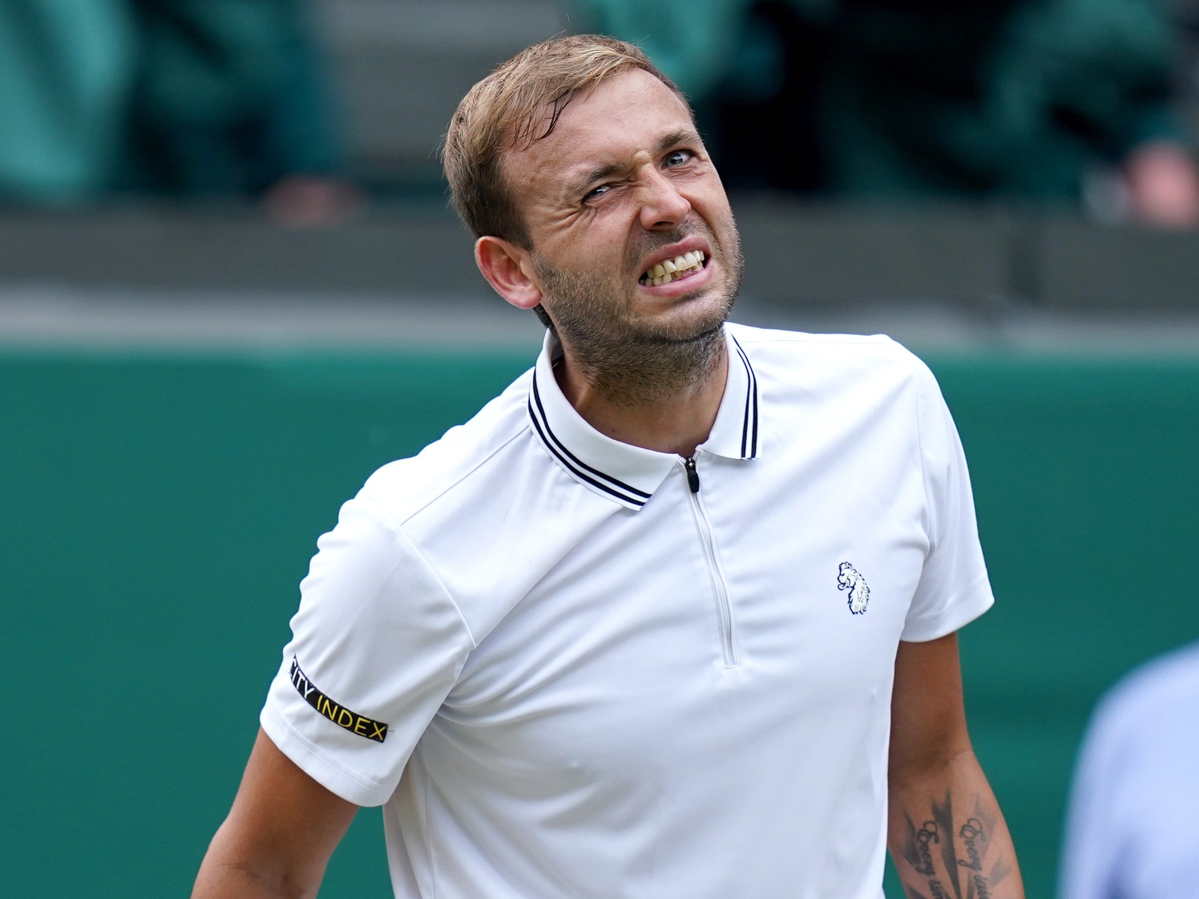 Dan Evans grimaces