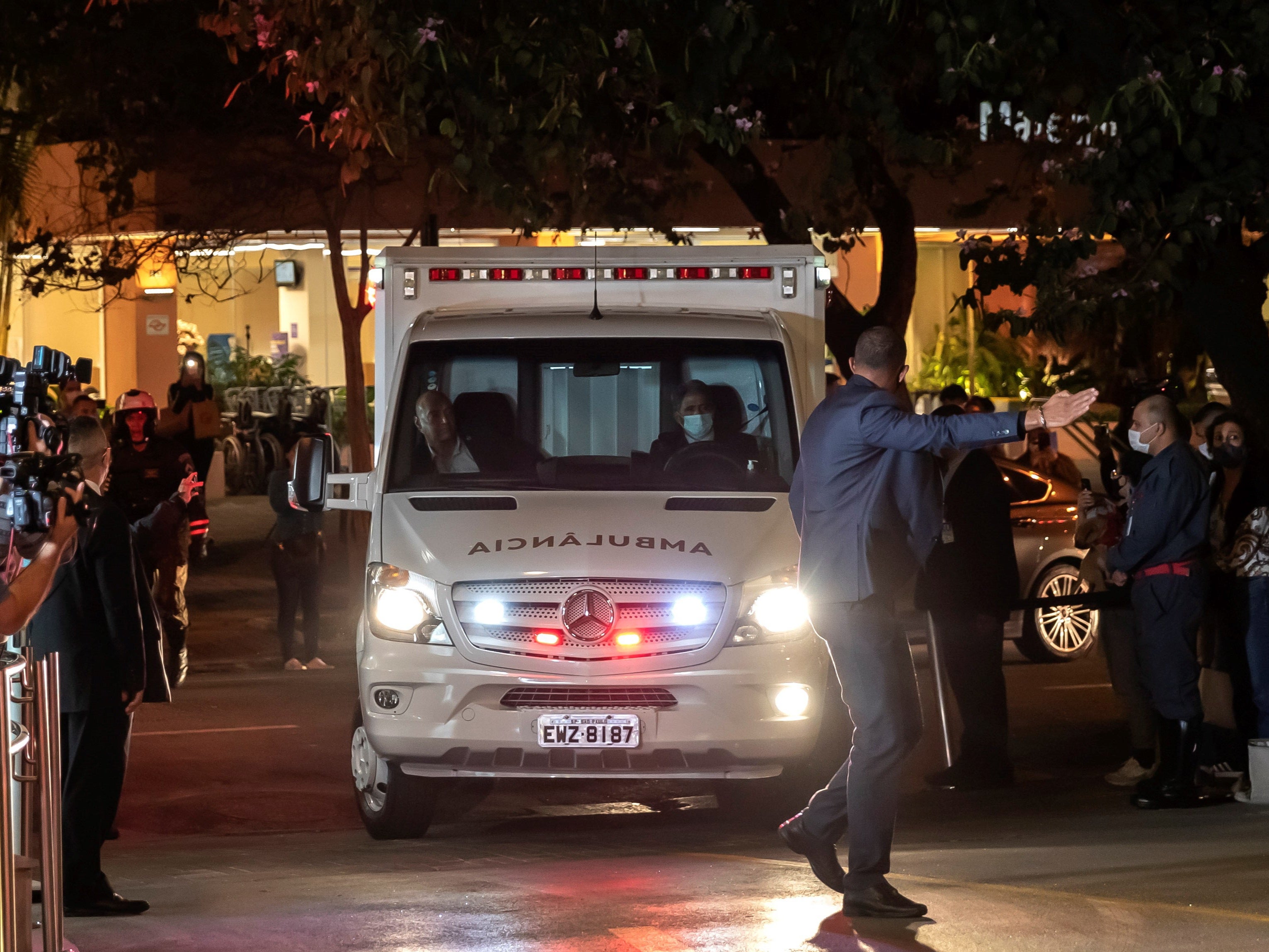 An ambulance transfers the president of Brazil, Jair Bolsonaro, to the Vila Nova Star Hospital, in Sao Paulo, Brazil