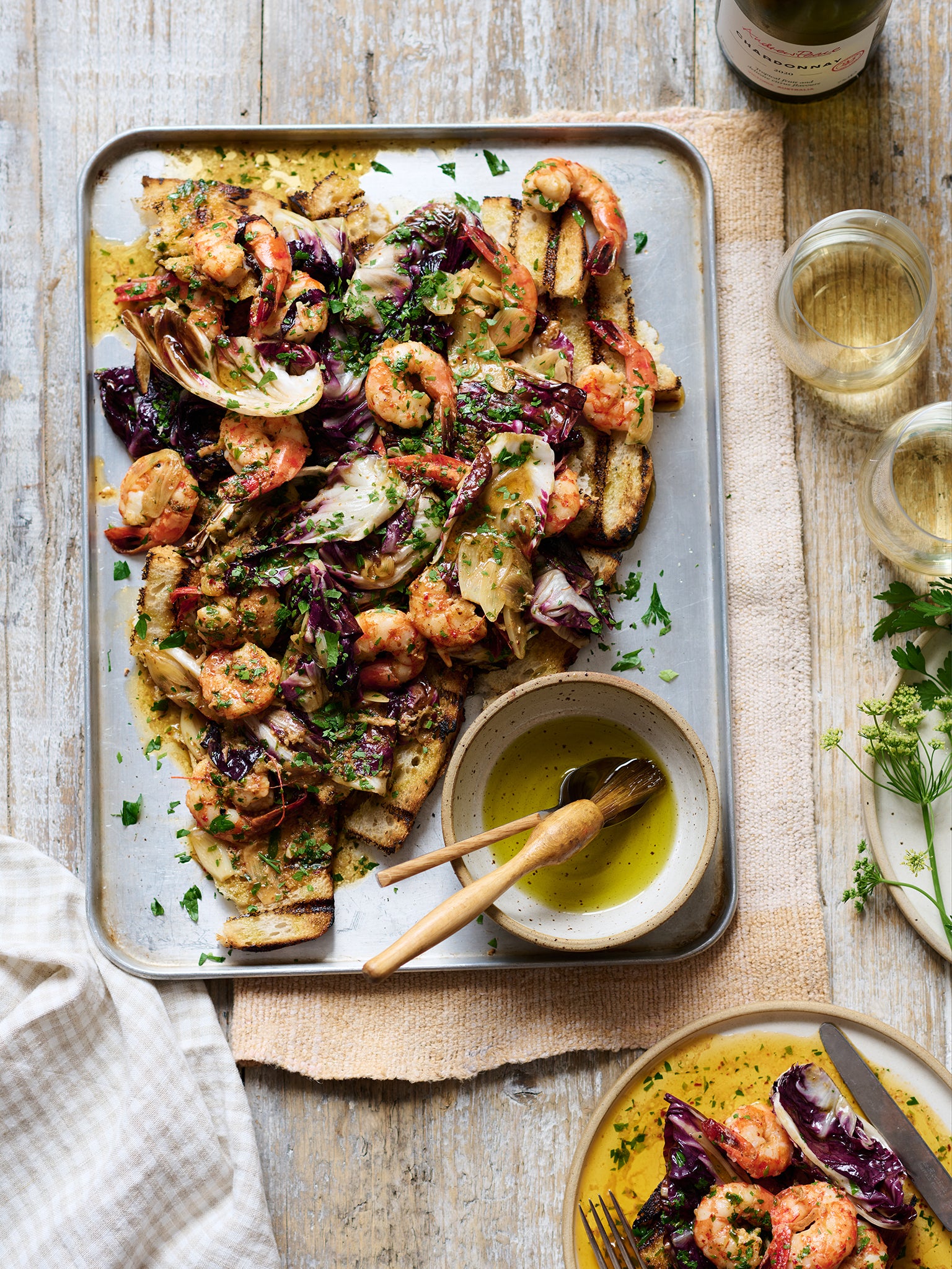 Prawns cooked in butter, drenched in lemon, with sourdough bread