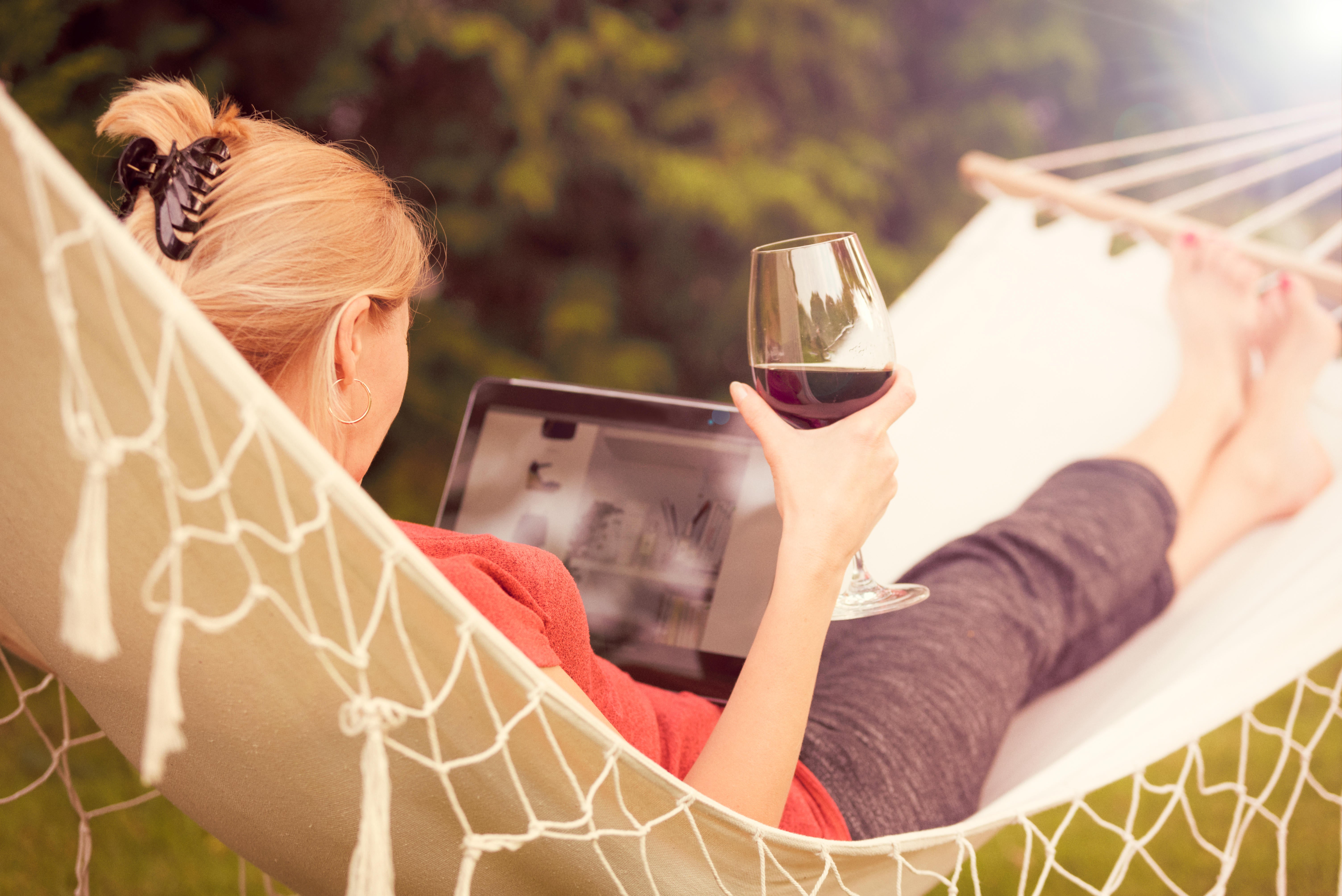 woman relaxing in hammock