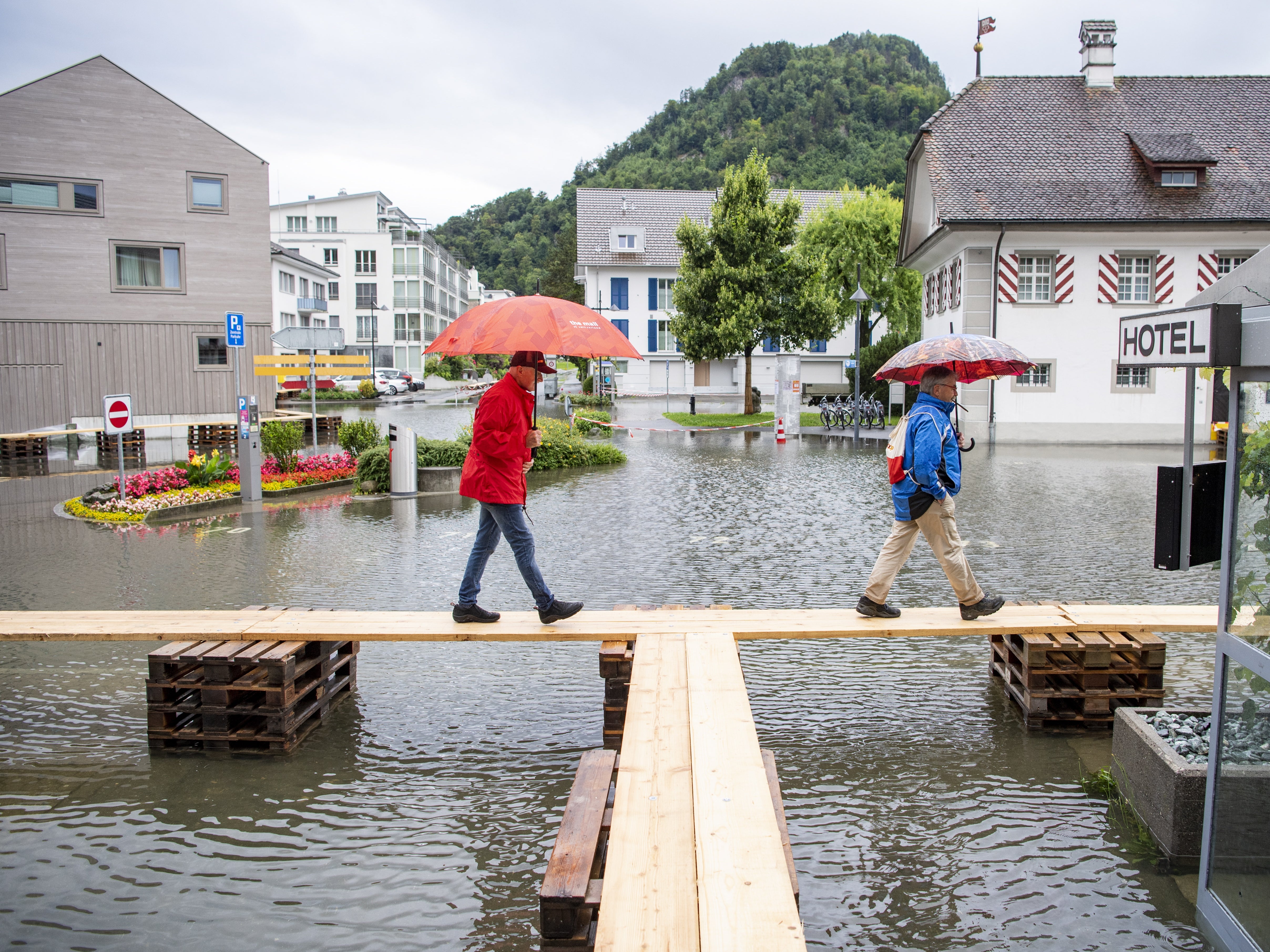 The village square of Stansstad in the canton of Nidwalden on Lake Vierwaldstaettersee is covered with flood water in Switzerland