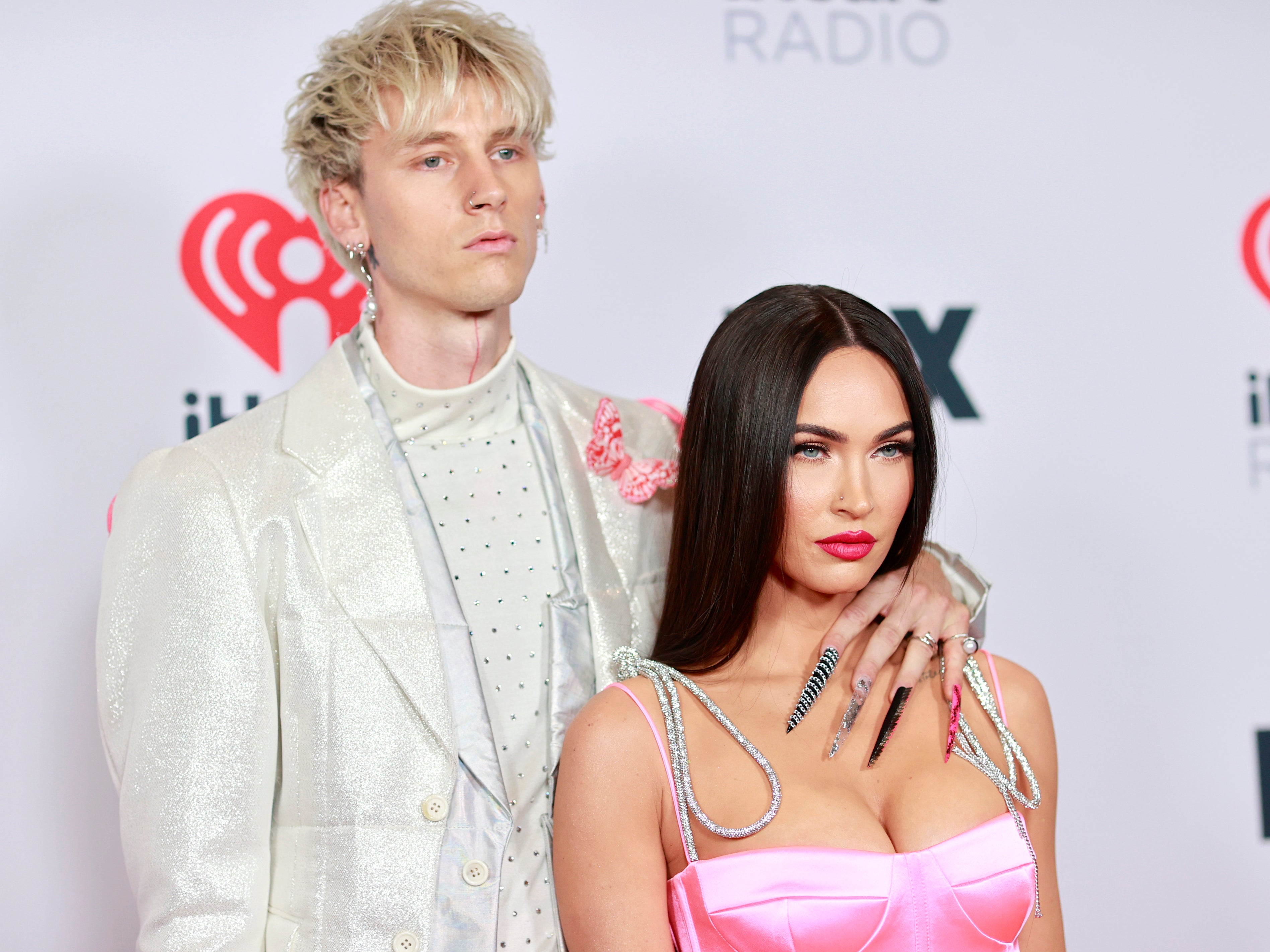 Machine Gun Kelly and Megan Fox attend the 2021 iHeartRadio Music Awards on 27 May 2021 in Los Angeles, California