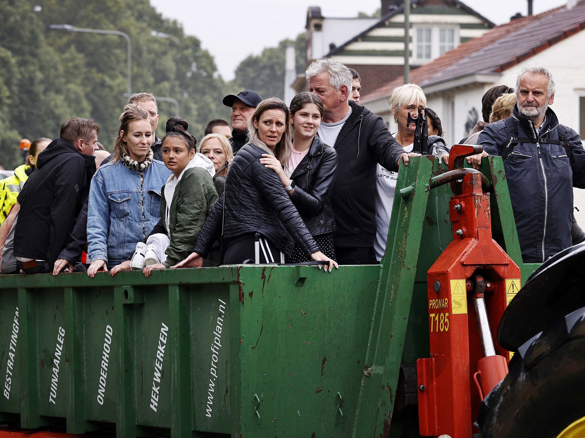 People are evacuated from their homes in South Limburg, the Netherlands, by the fire brigade