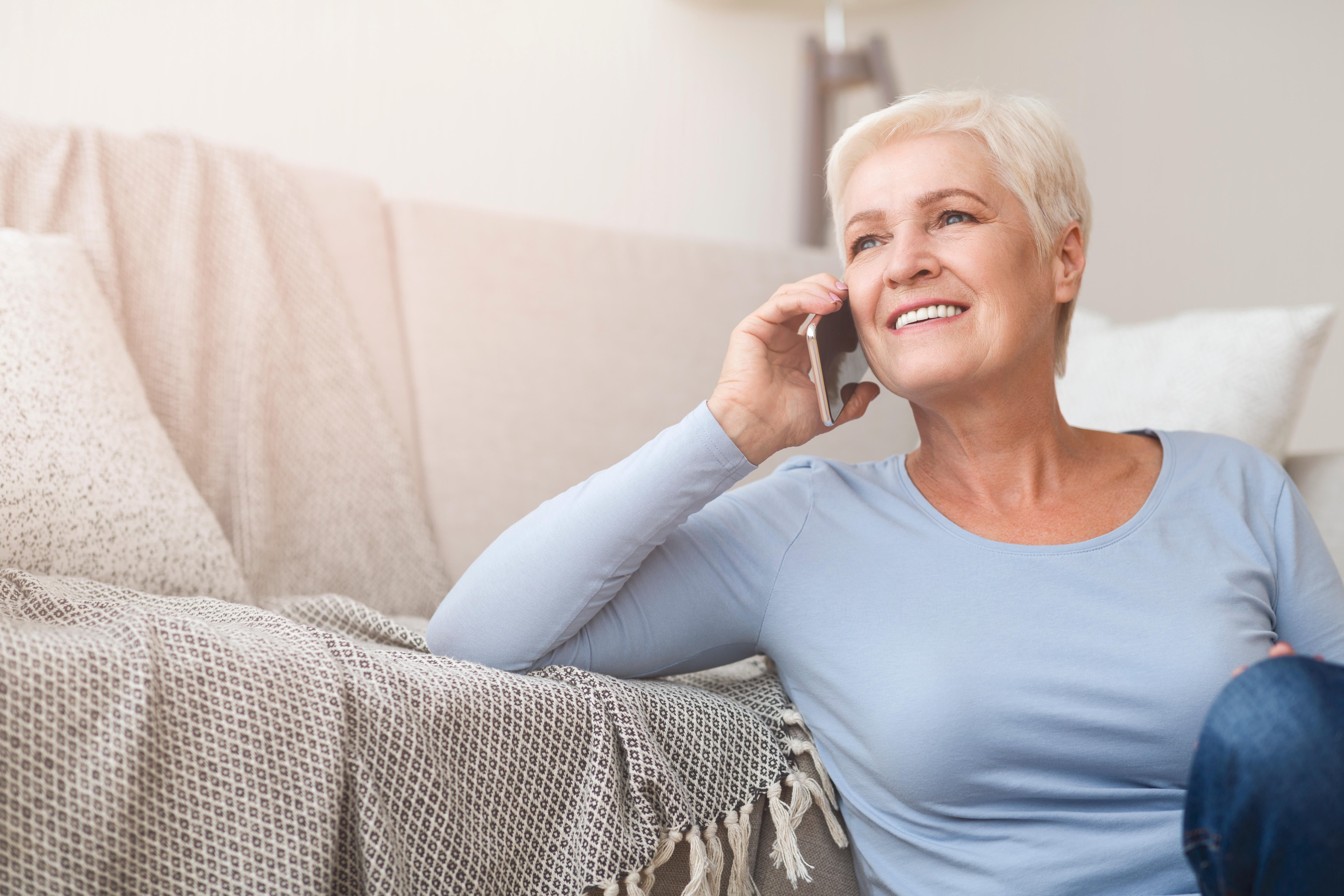 Female pensioner on the phone