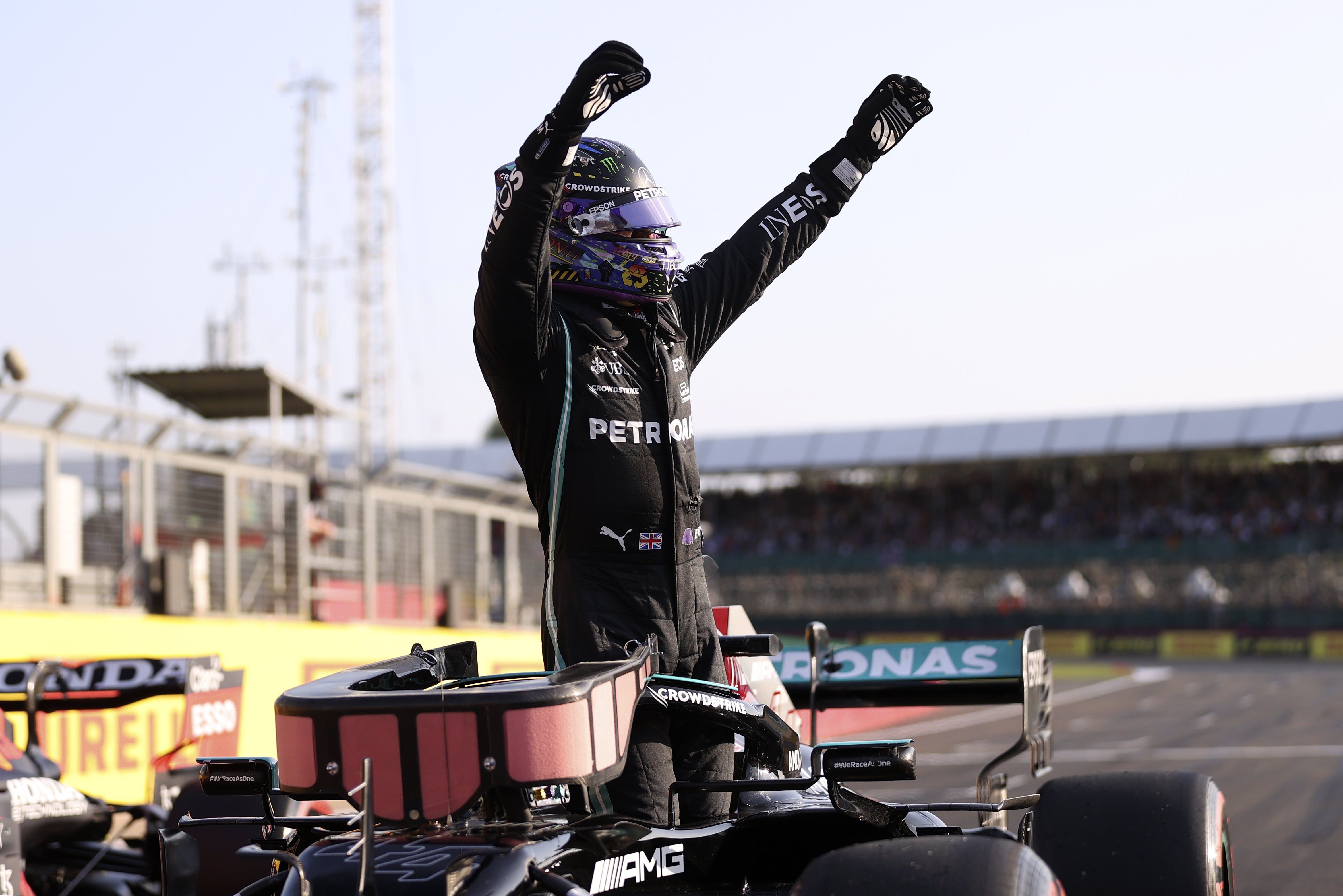 Lewis Hamilton celebrates his pole position