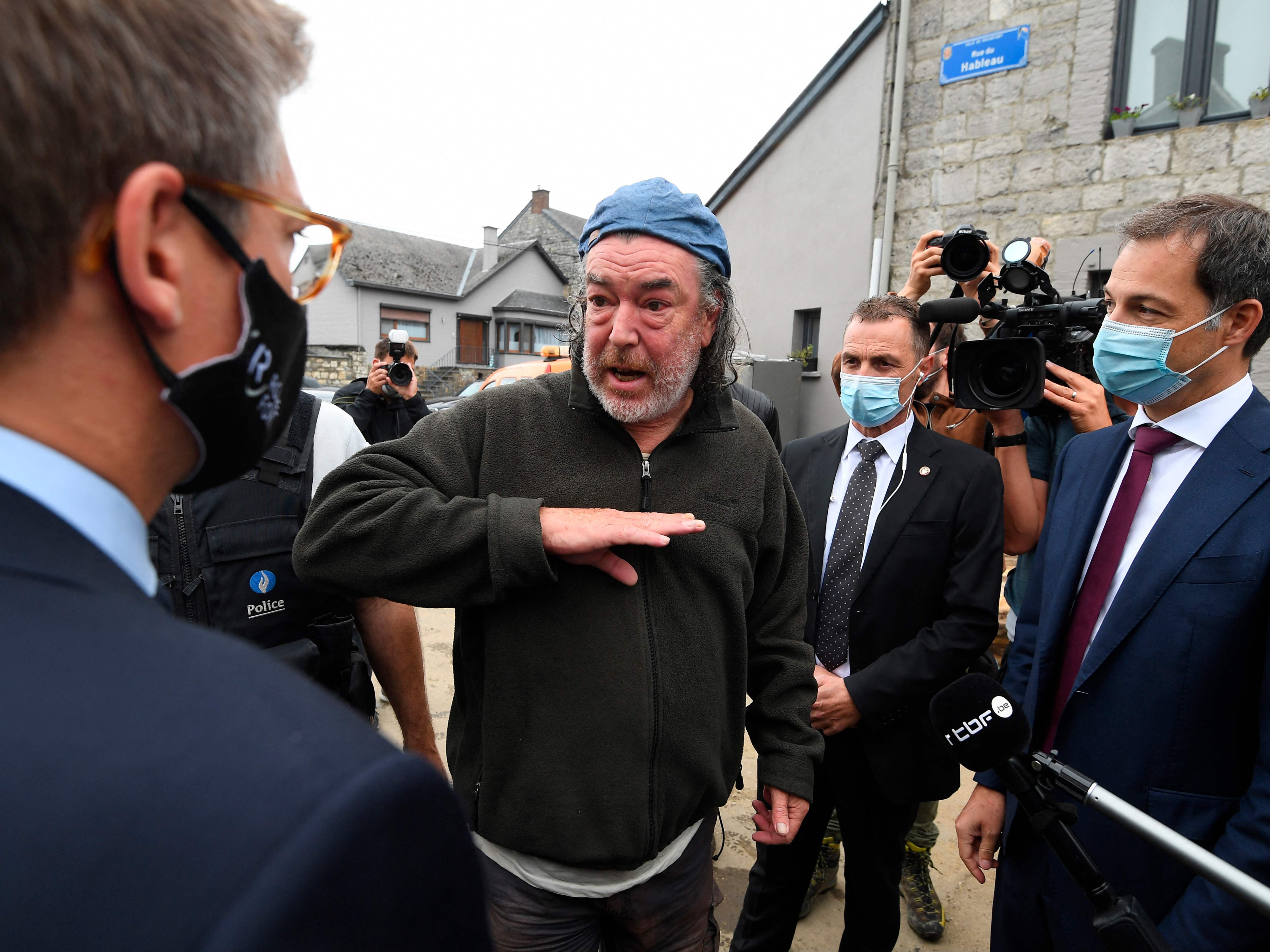 Belgium’s prime minister (right) visiting the town of Rochefort