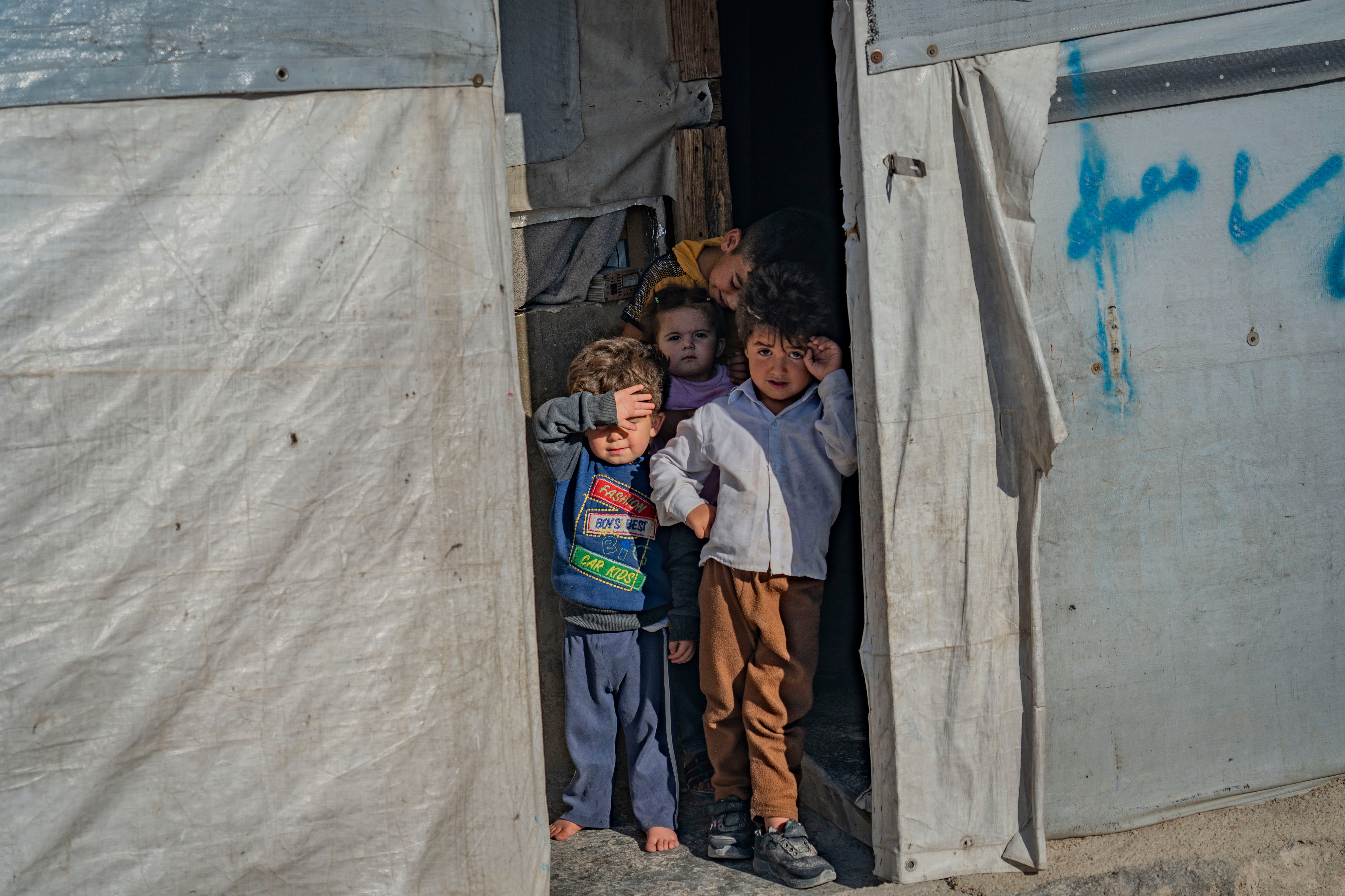 Syrian refugees in a camp in Arsal, where families say they cannot survive in Lebanon any more