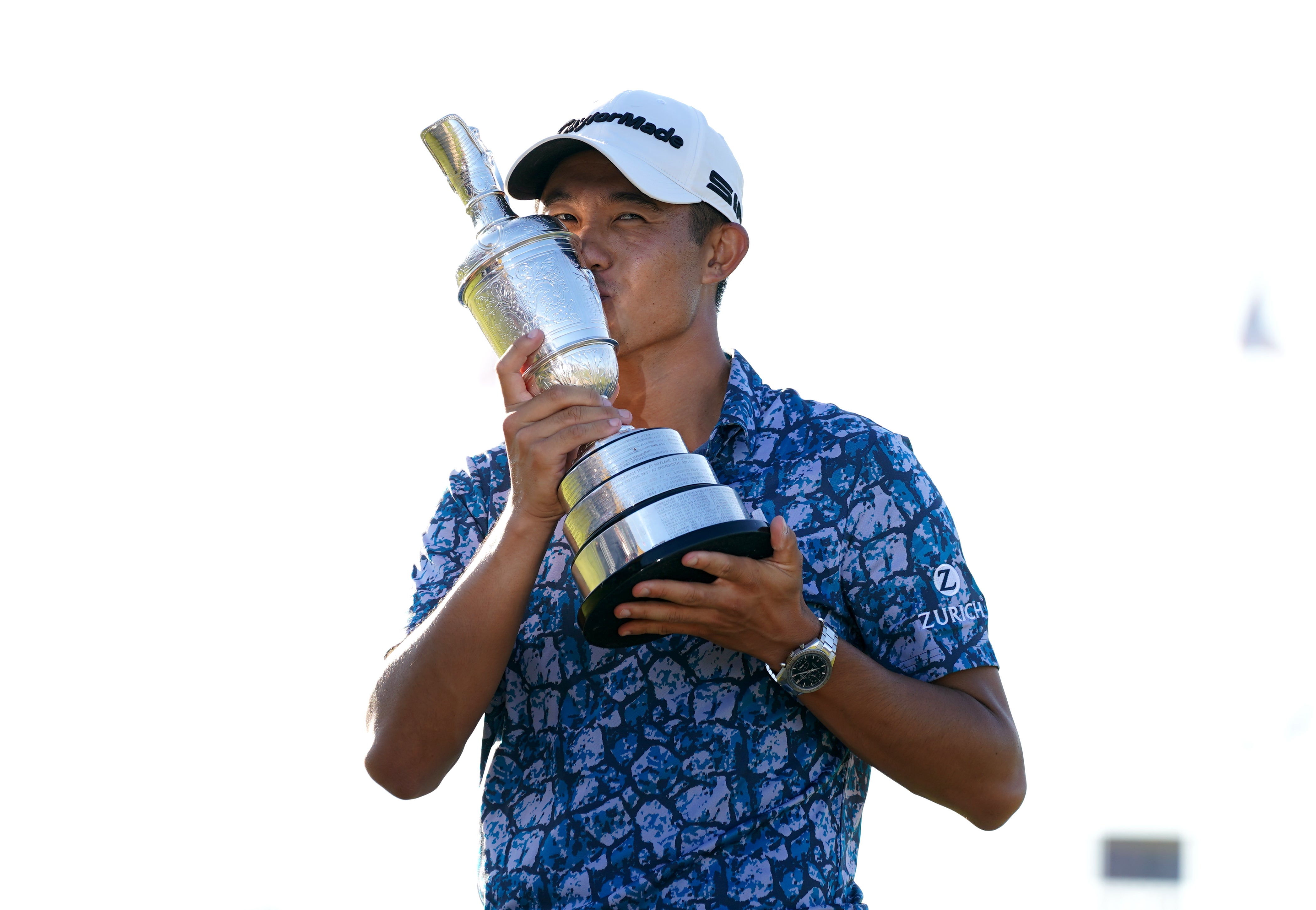 Collin Morikawa kisses the Claret Jug