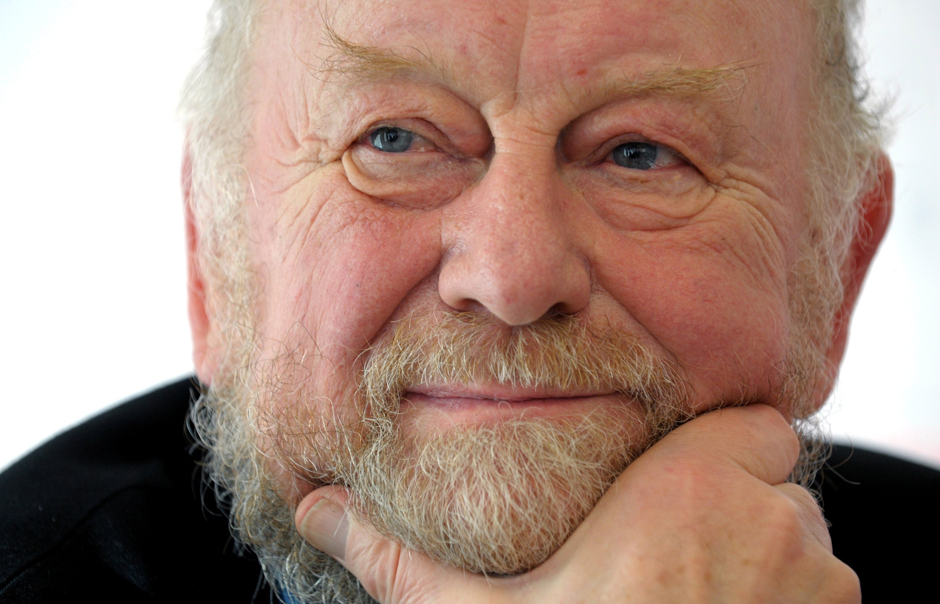 File image: Danish caricaturist Kurt Westergaard smiles in Liepzig, Germany, 8 October 2010 (reissued 18 July 2021). According to his family, Kurt Westergaard has died aged 86