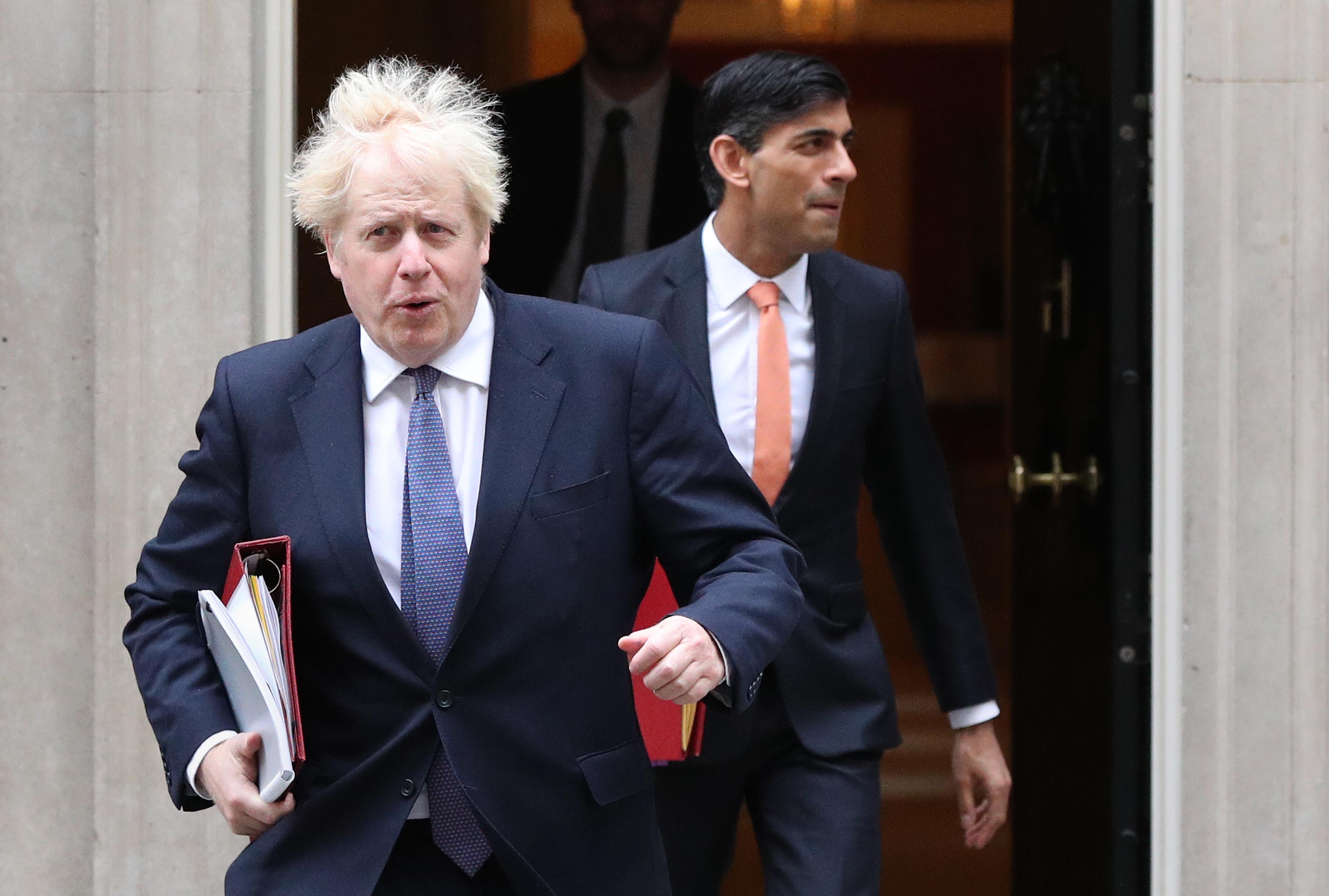 Boris Johnson, left, with Rishi Sunak. Both men are currently isolating