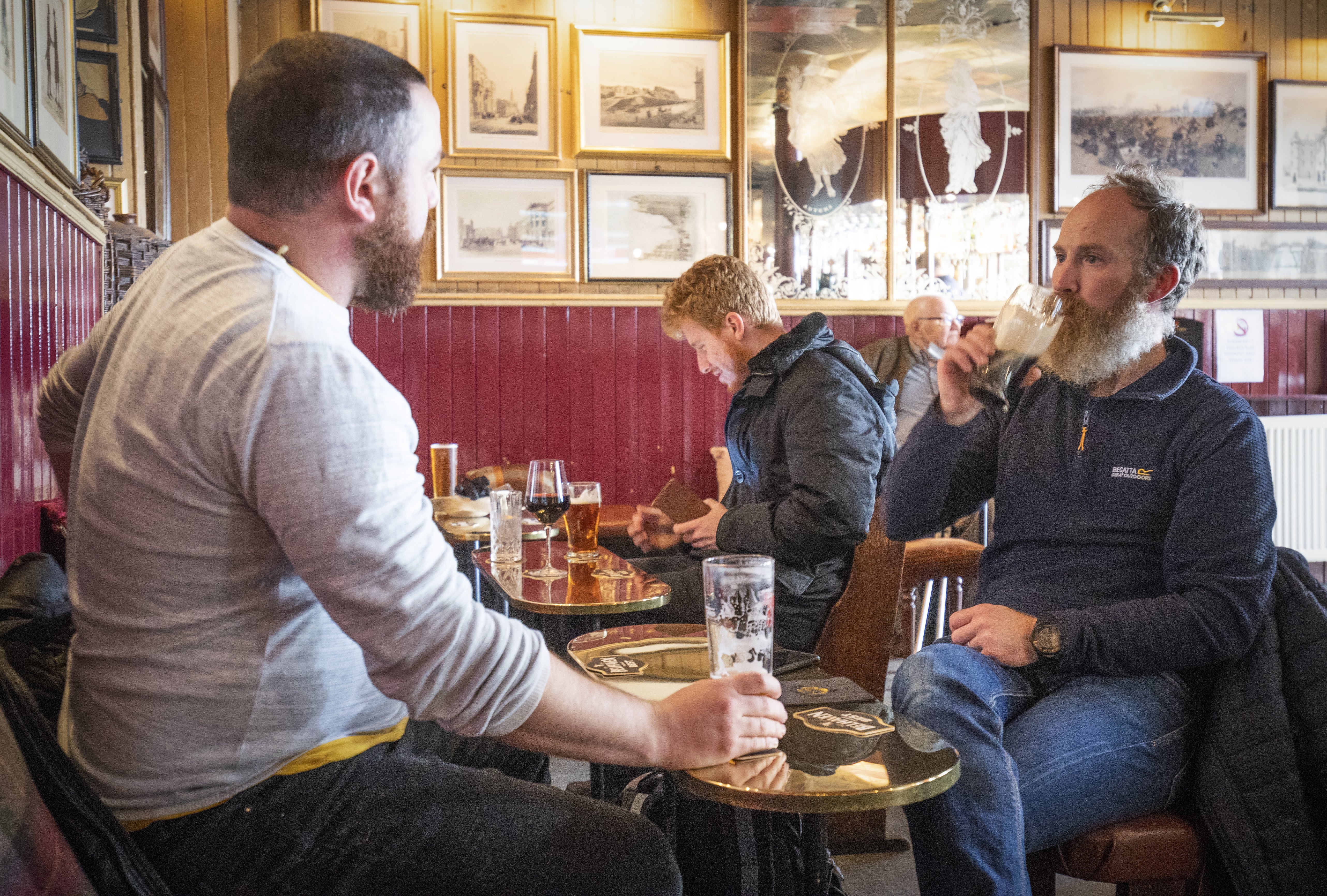 Men drink in pub