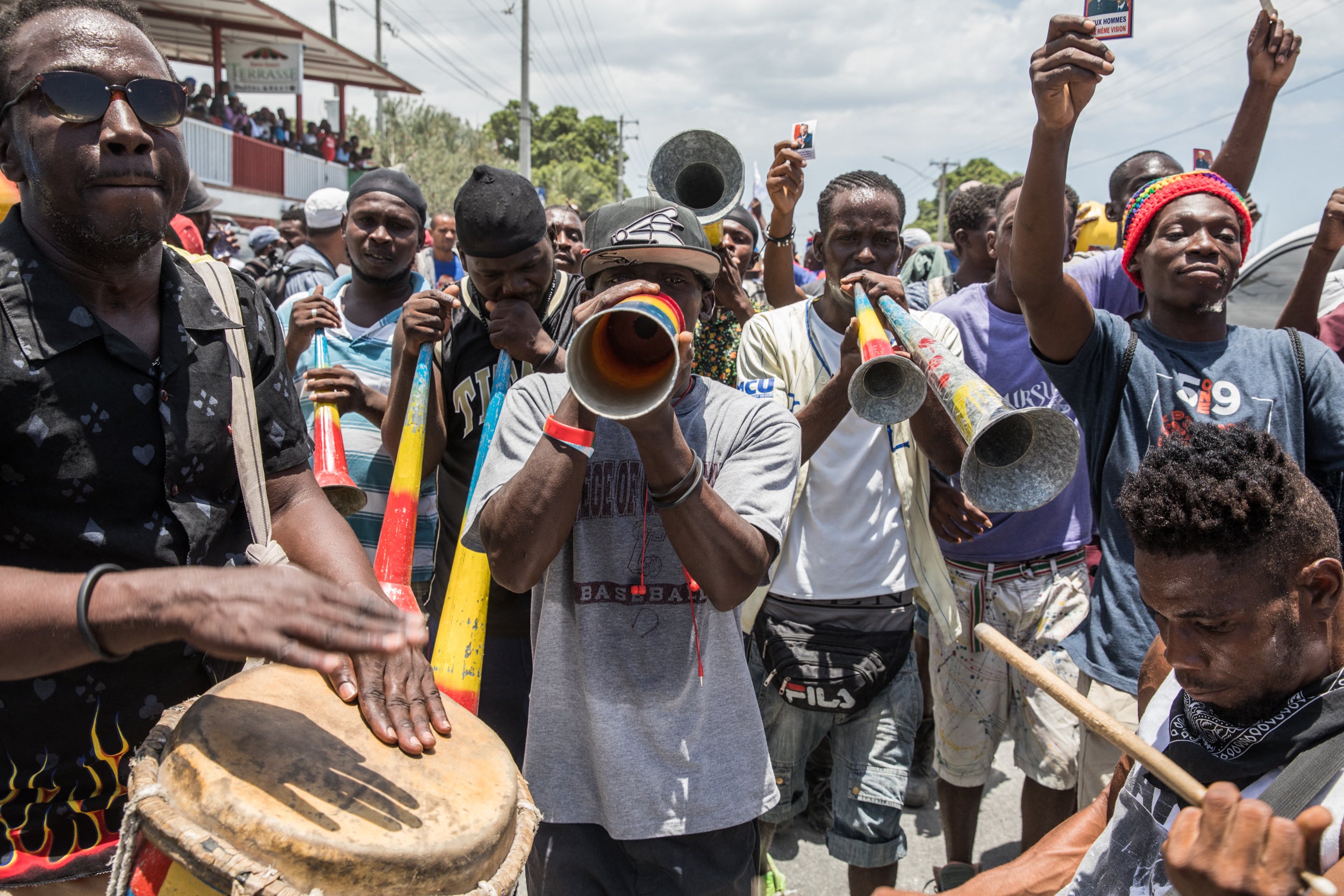 Supporters of former president Jean-Bertrand Aristide celebrated his return from medical treatment in Cuba