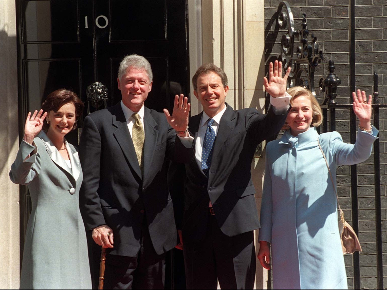 Bill and Hillary Clinton pose with Tony and Cherie Blair outside Downing Street in 1997