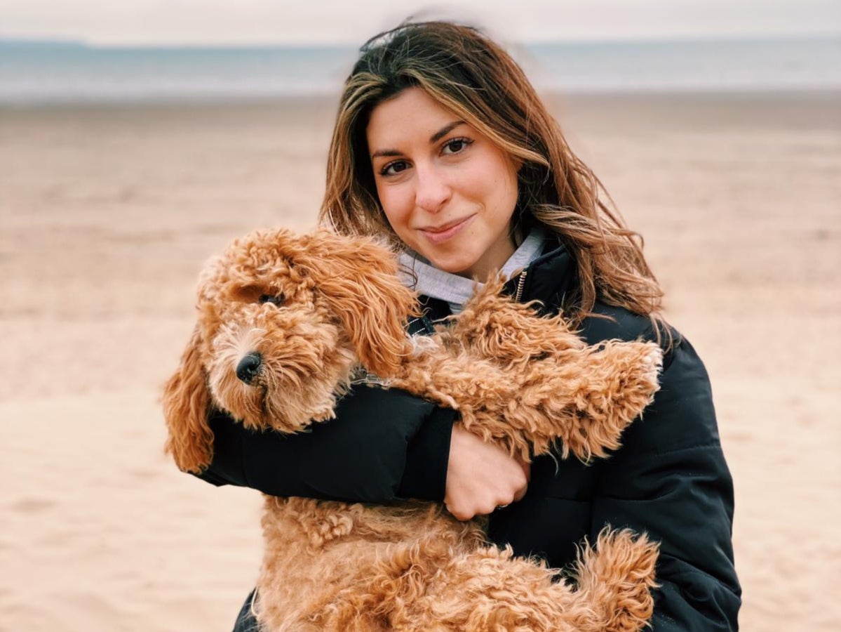 Angelica Malin, 30, with her cavapoochon Alfie