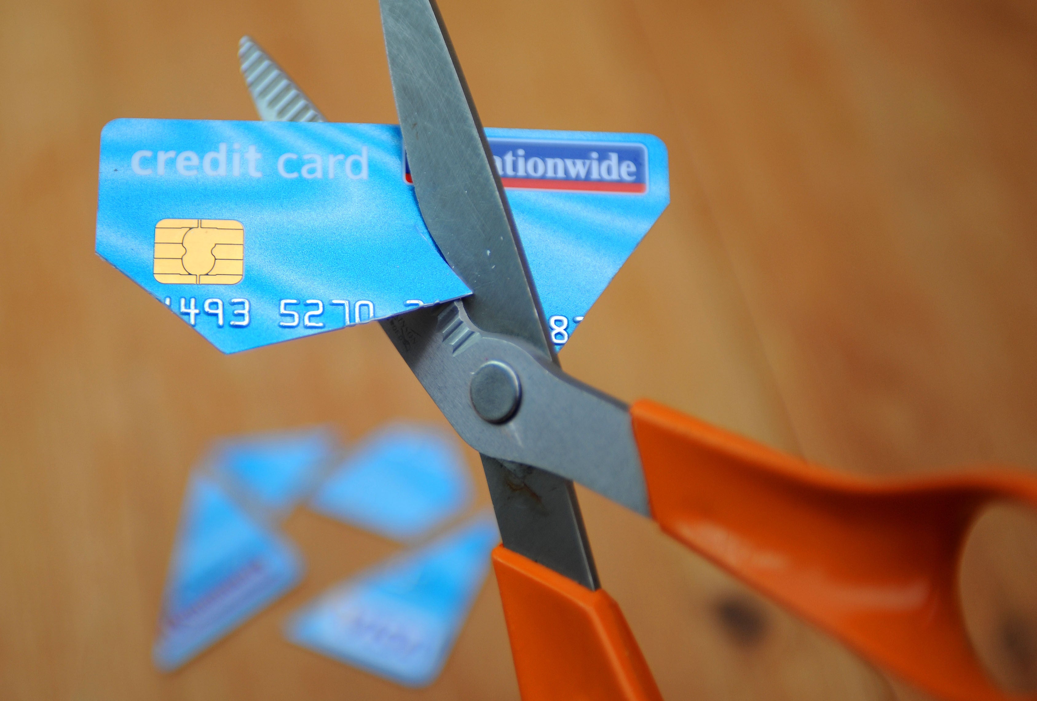 A credit card being cut up