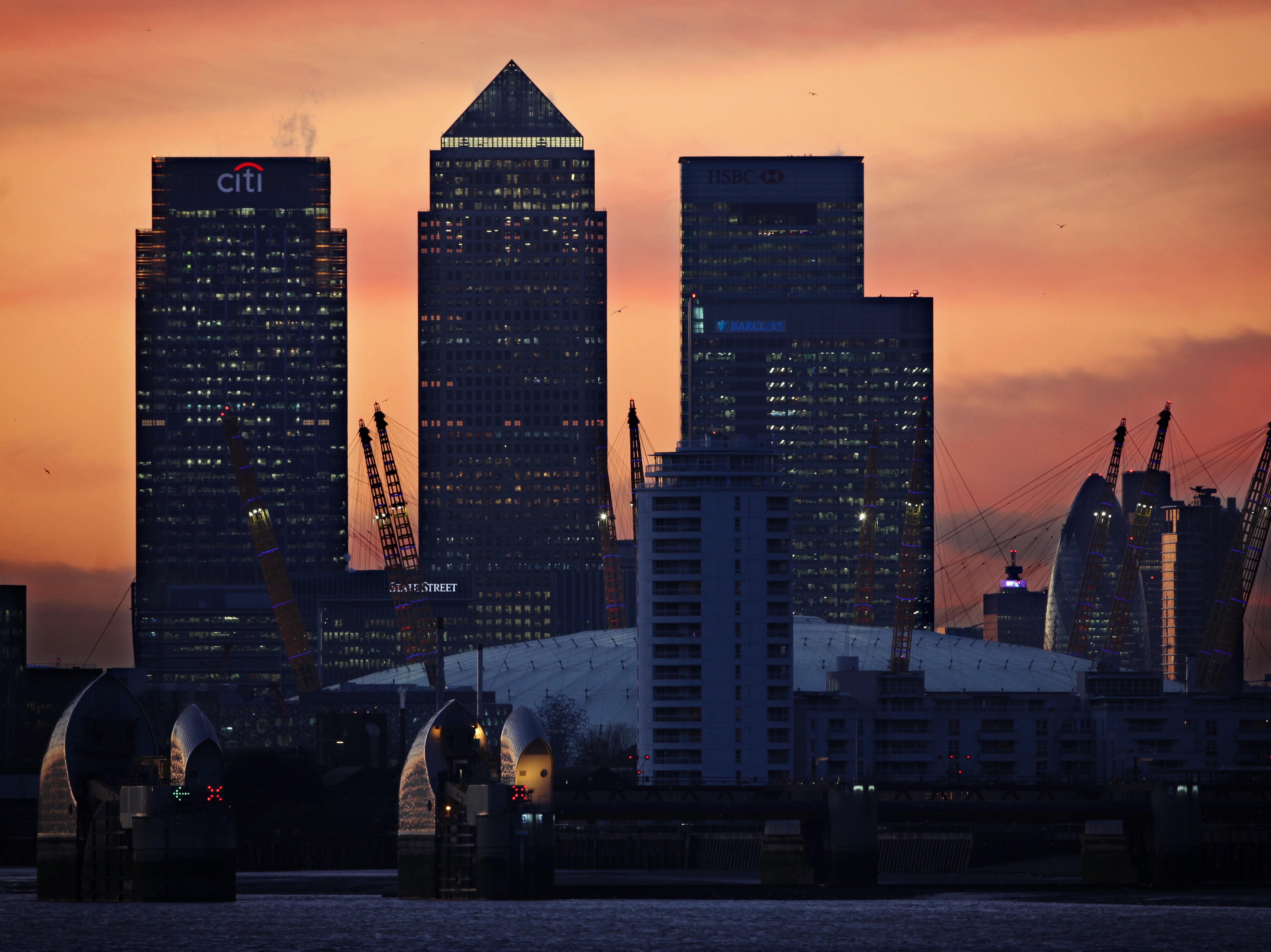 Three men were found with stab wounds at Canary Wharf on Monday evening