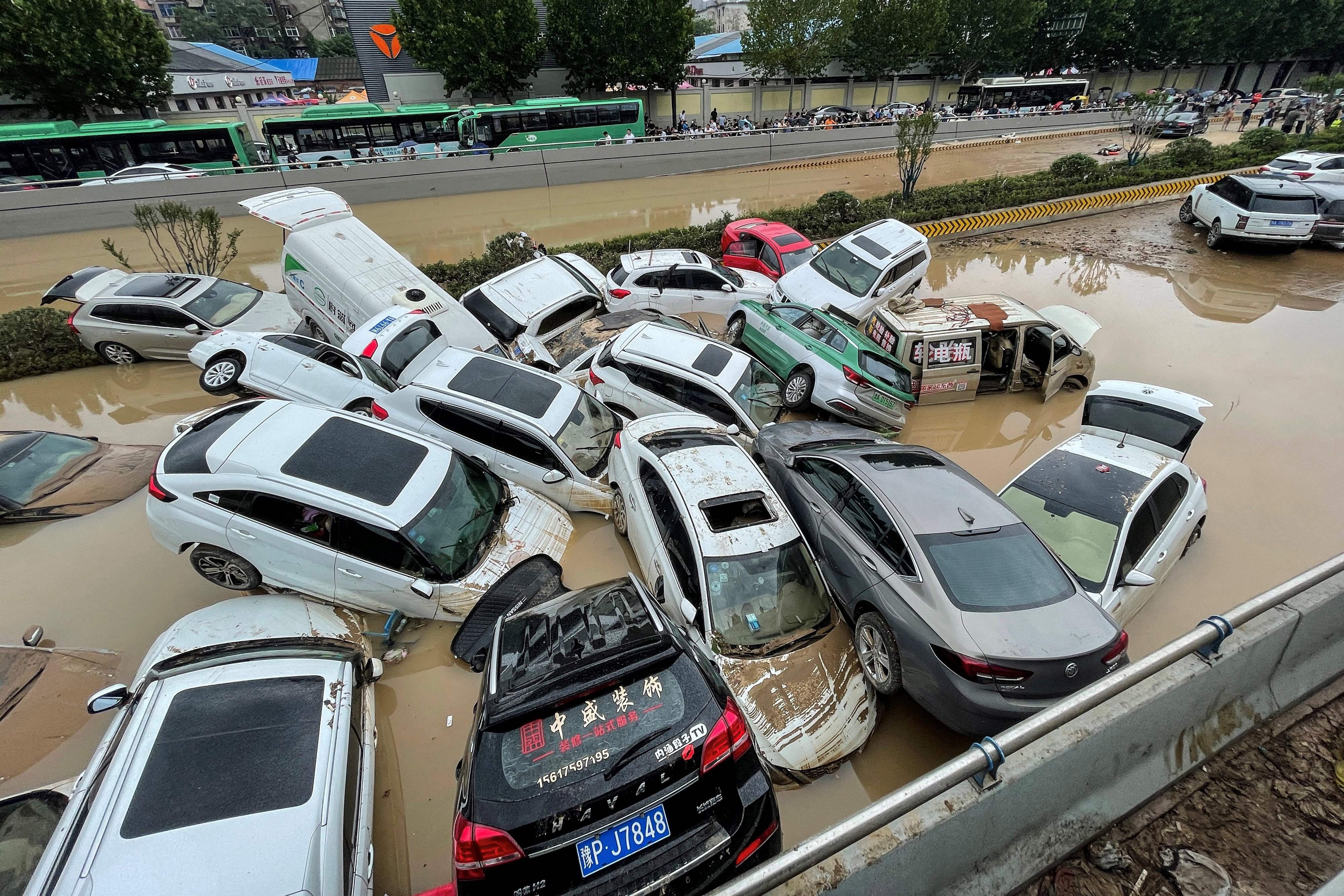 Cars sit in floodwater in the Chinese city of Zhengzhou on 21 July, 2021.