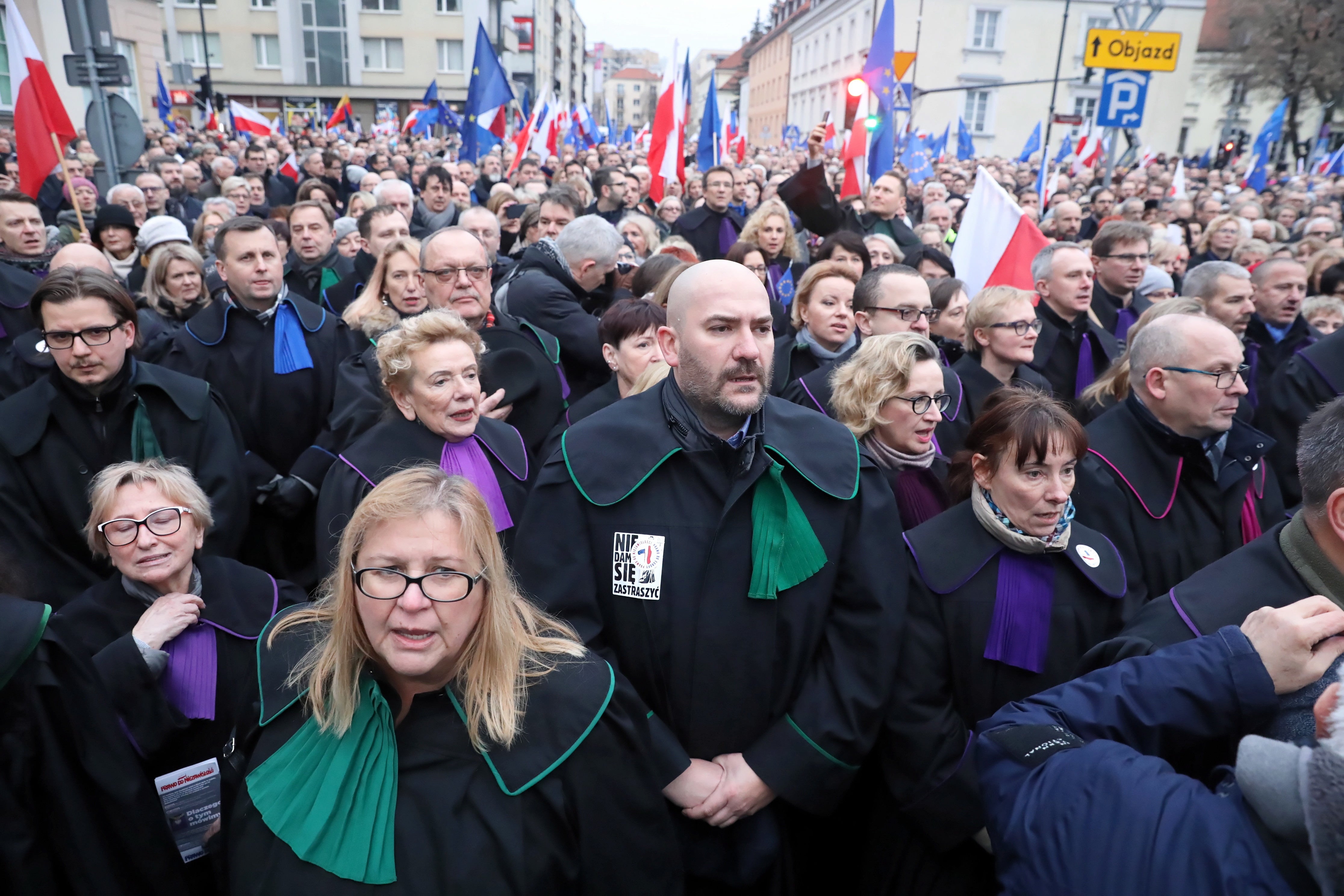 Judges and lawyers from across Europe take part in the ‘March of a Thousand Togas’ to protest against amendments to Poland’s judicial laws