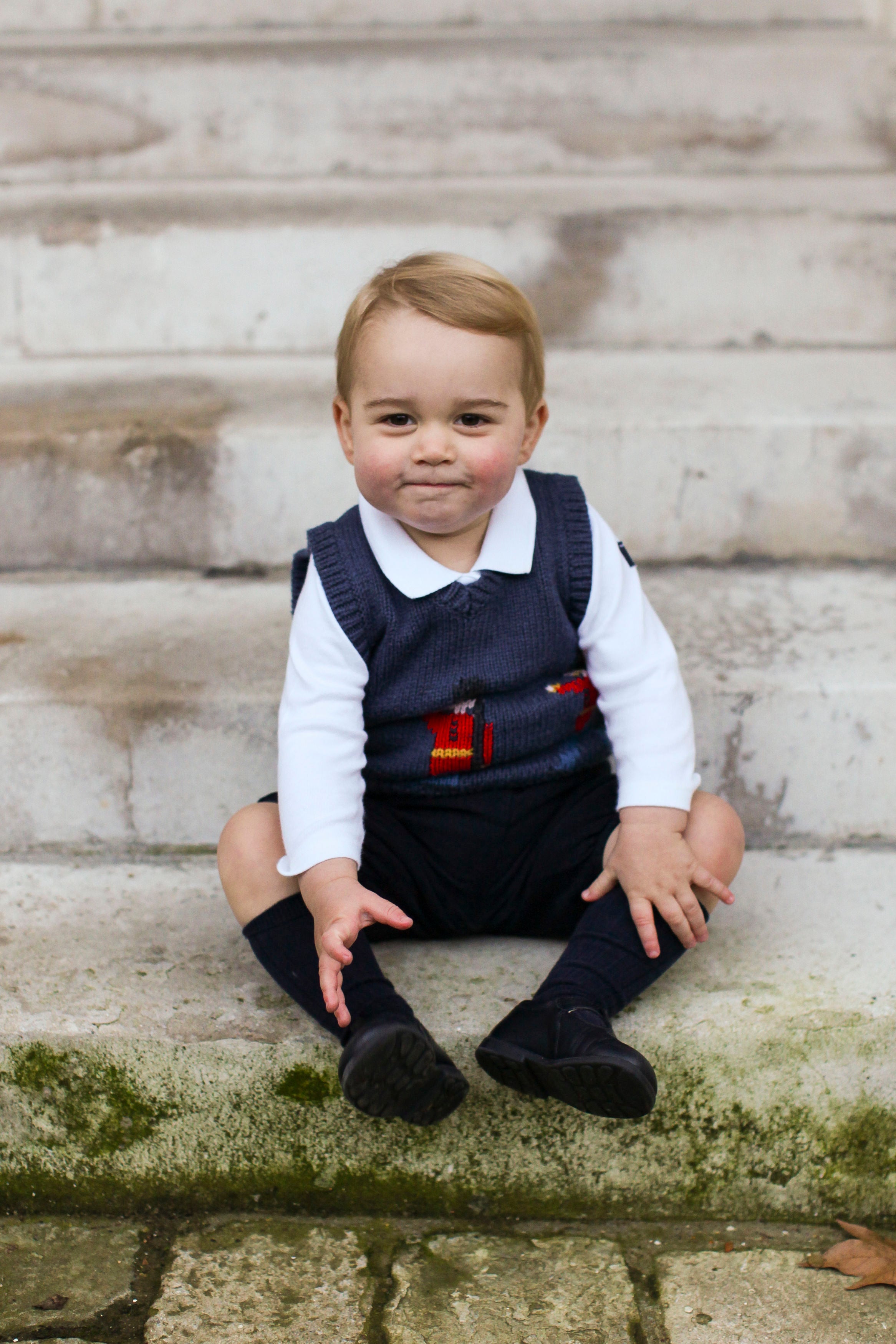 Prince George in a courtyard at Kensington Palace (Kensignton Palace/PA)