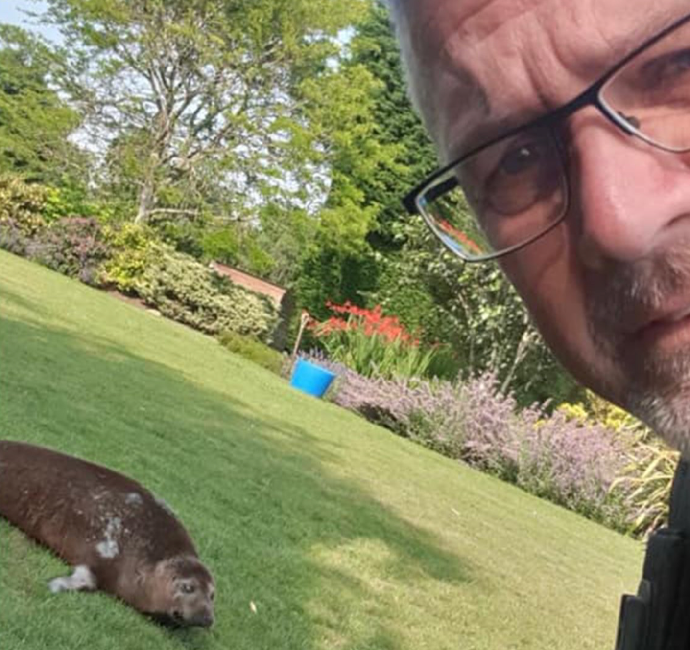 PC Green with Dandy, who moved into the shade as the sun got stronger