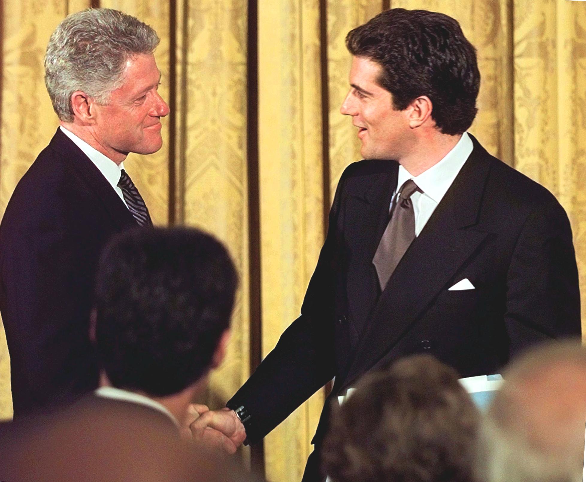 John F Kennedy Jr with President Bill Clinton at the White House in 1998