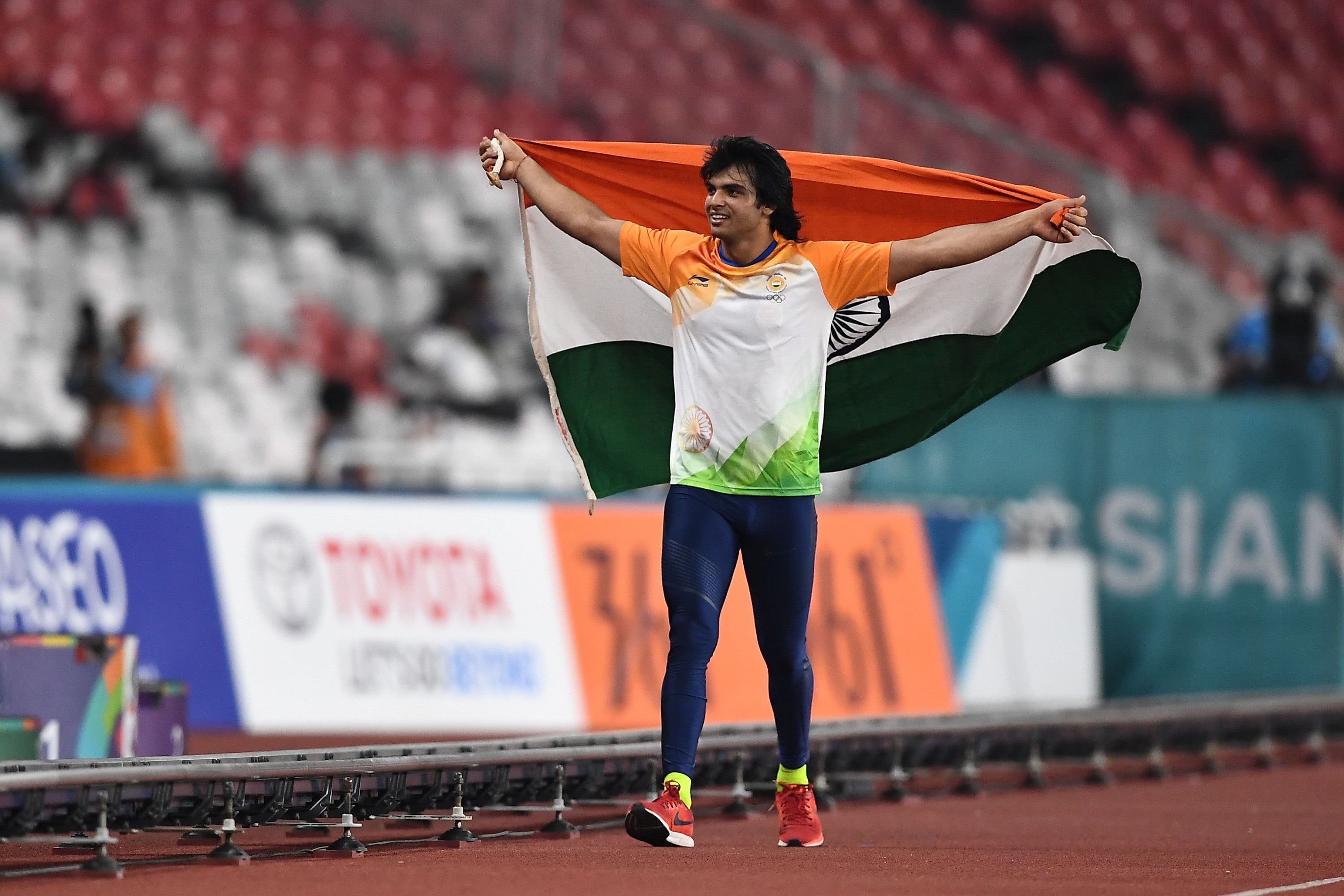 Neeraj Chopra of India celebrates victory after winning the Men’s Javelin Throw on day nine of the Asian Games in 2018