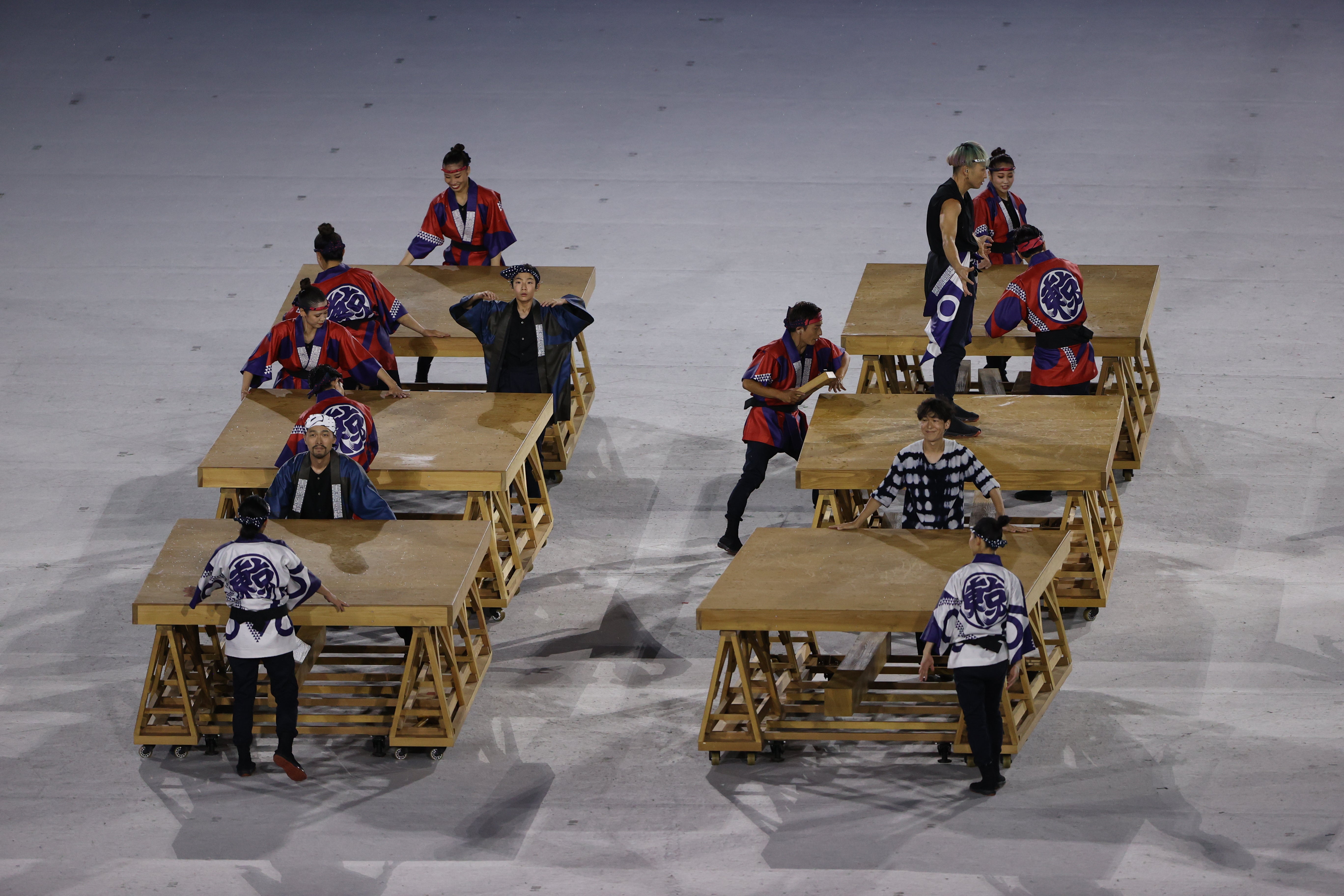 Performers are seen during the Opening Ceremony of the Tokyo 2020 Olympic Games at Olympic Stadium