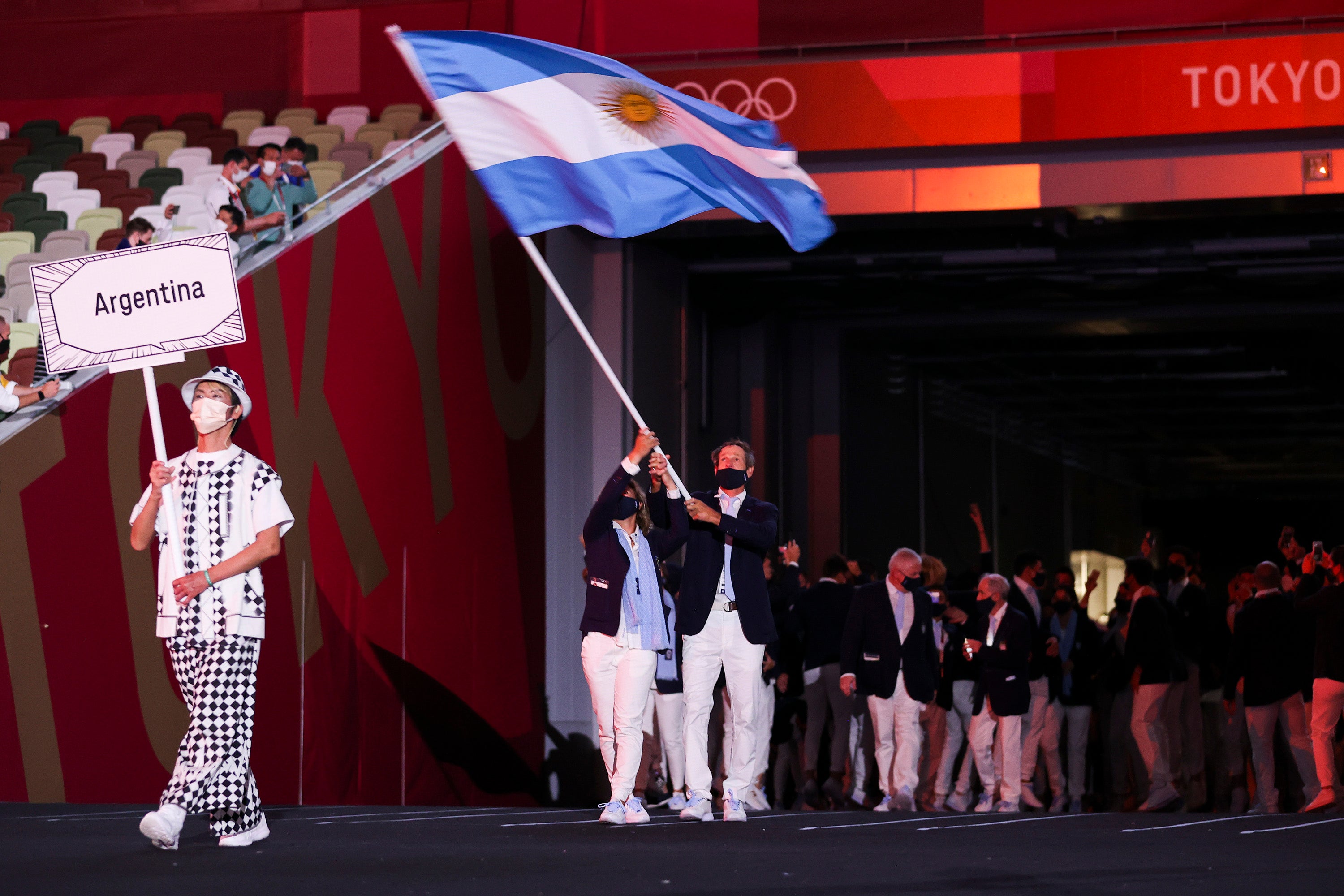 Flag bearers Cecilia Carranza Saroli and Santiago Raul Lange of Team Argentina during the Opening Ceremony of the Tokyo 2020 Olympic Games