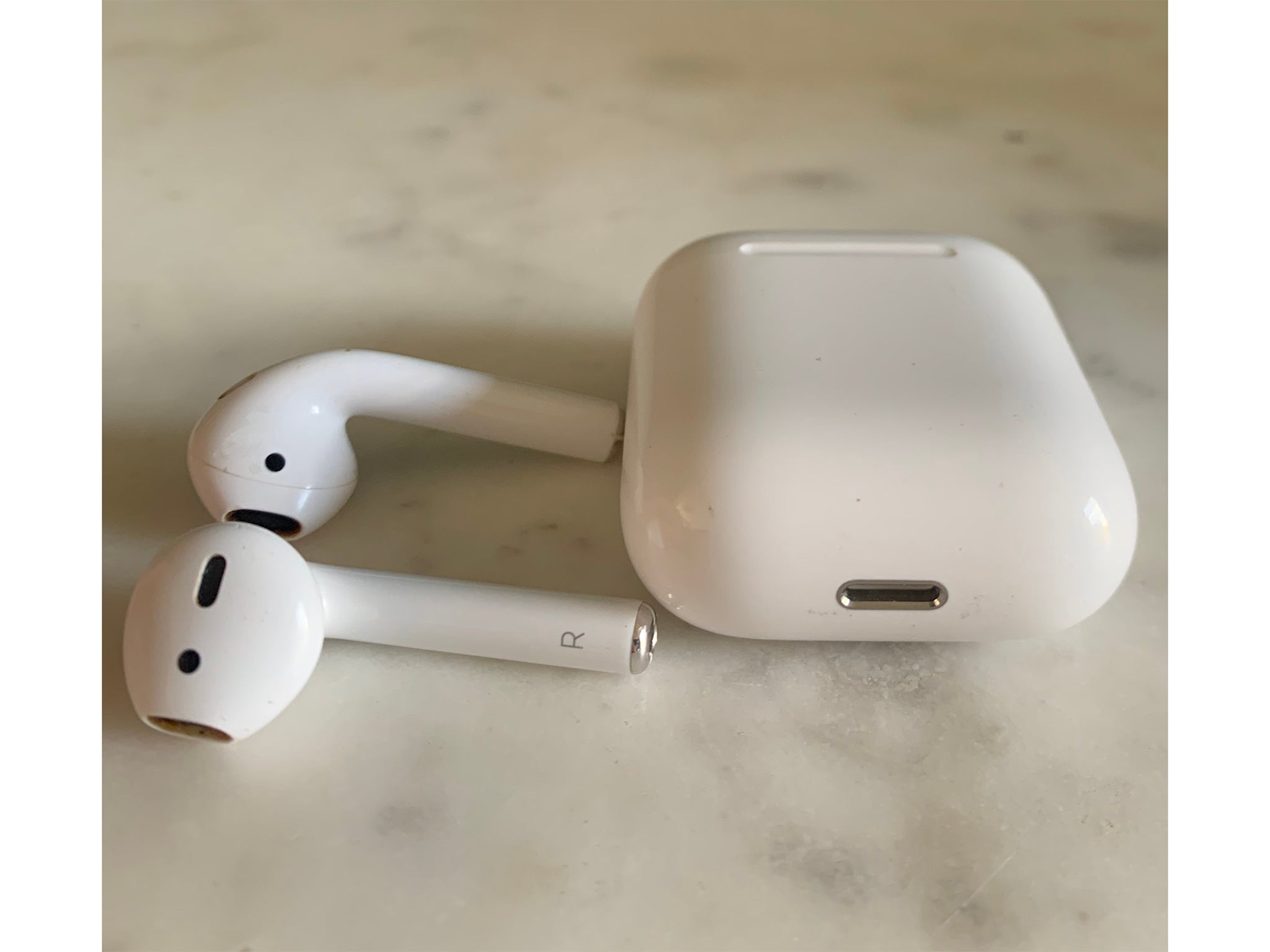 The AirPods have a long stem on each earpiece