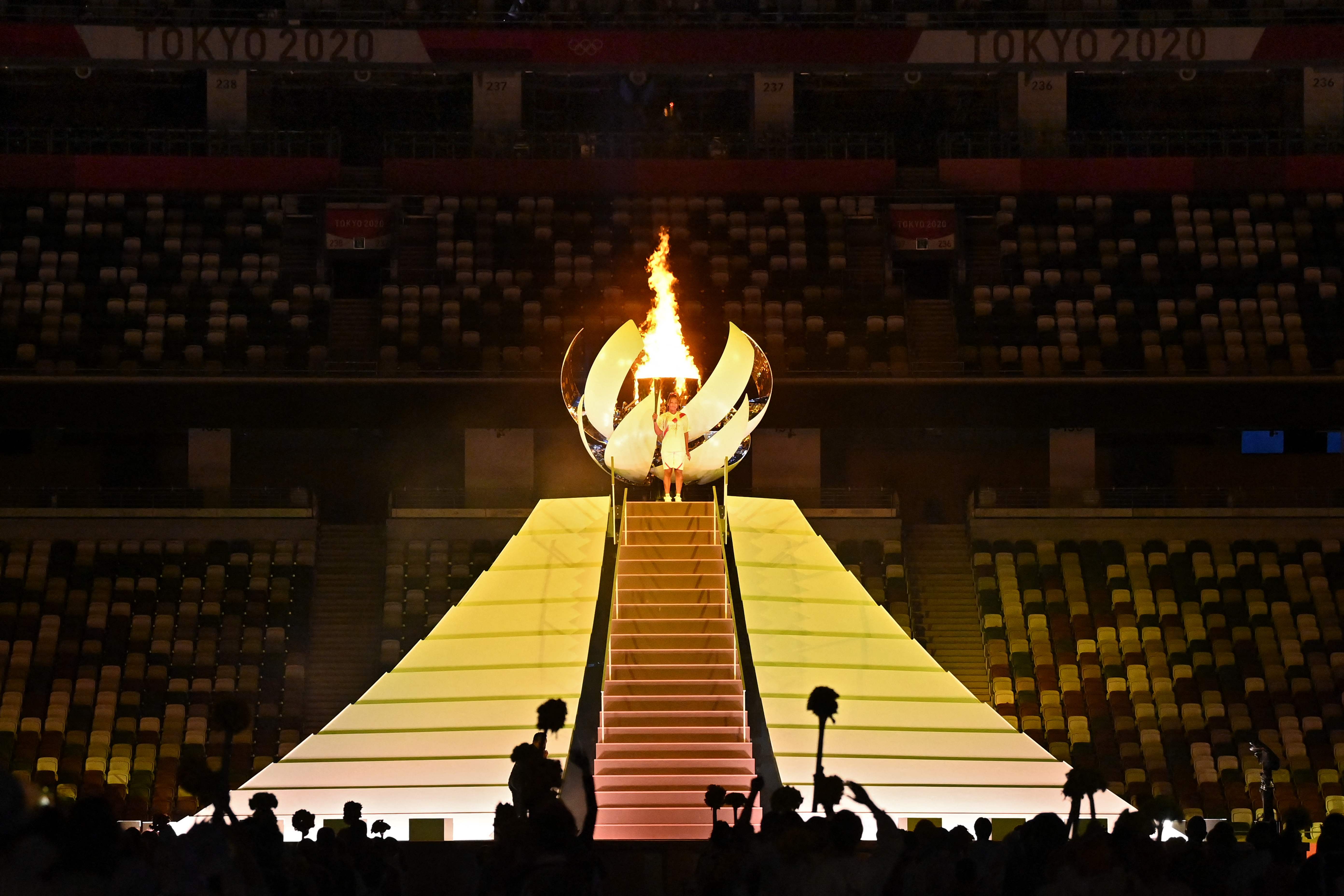 Naomi Osaka lights the Olympic flame