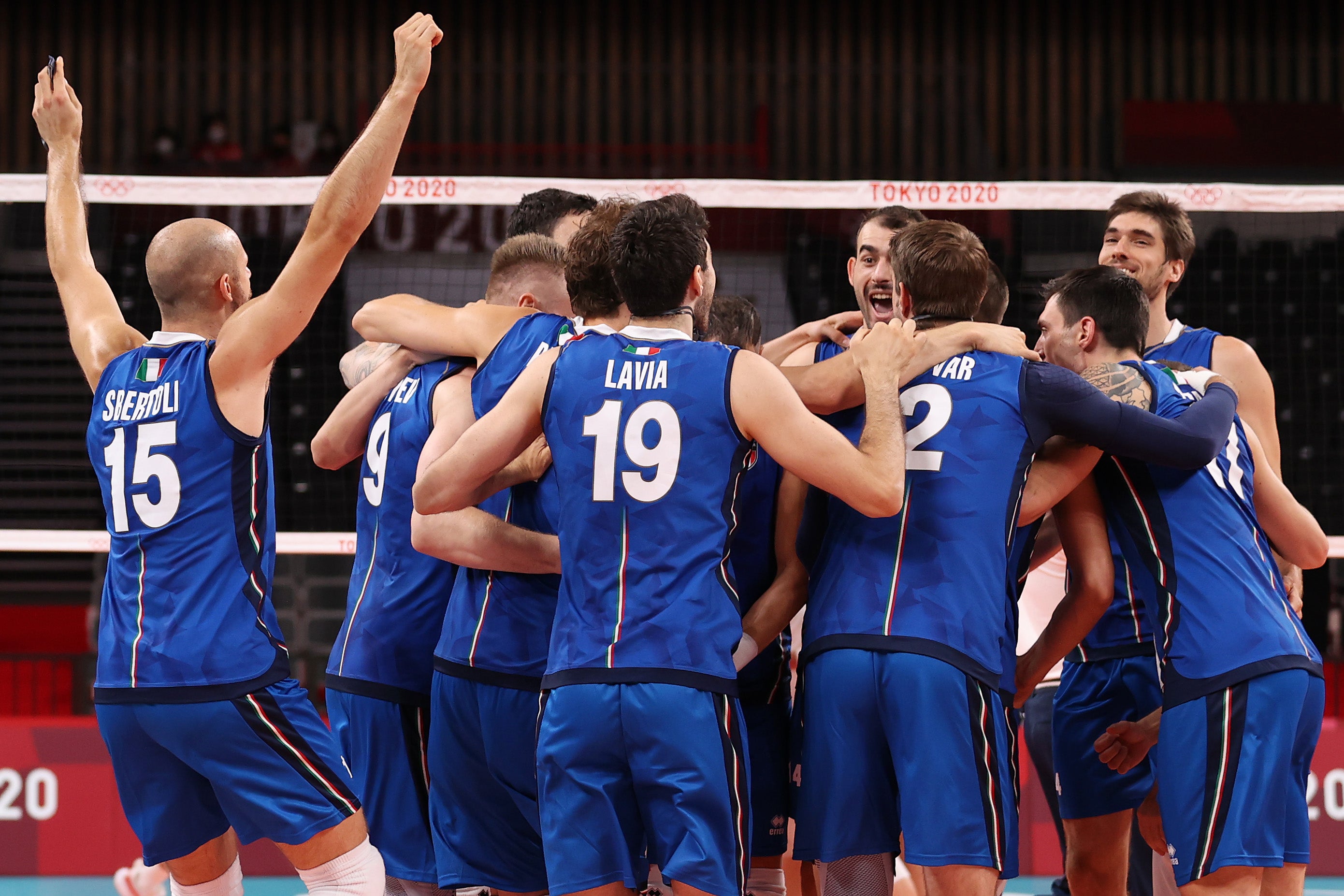 Team Italy celebrates after defeating Team Canada in the Men's Preliminary Round - Pool A on day one of the Tokyo 2020 Olympic Games at Ariake Arena on 24 July 2021 in Tokyo, Japan