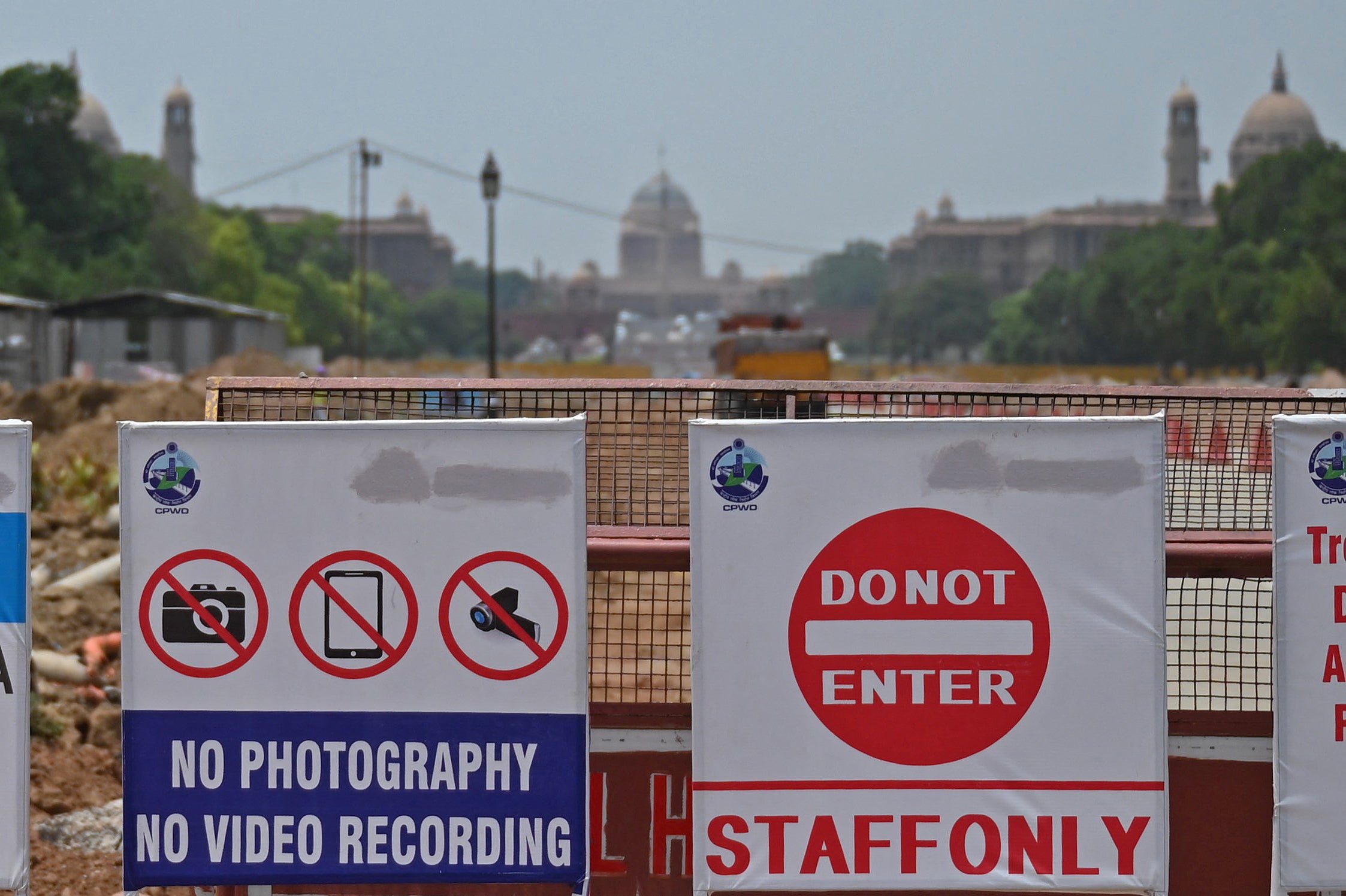 Notices barring anyone entry are pasted next to the redevelopment site of the Central Vista Avenue