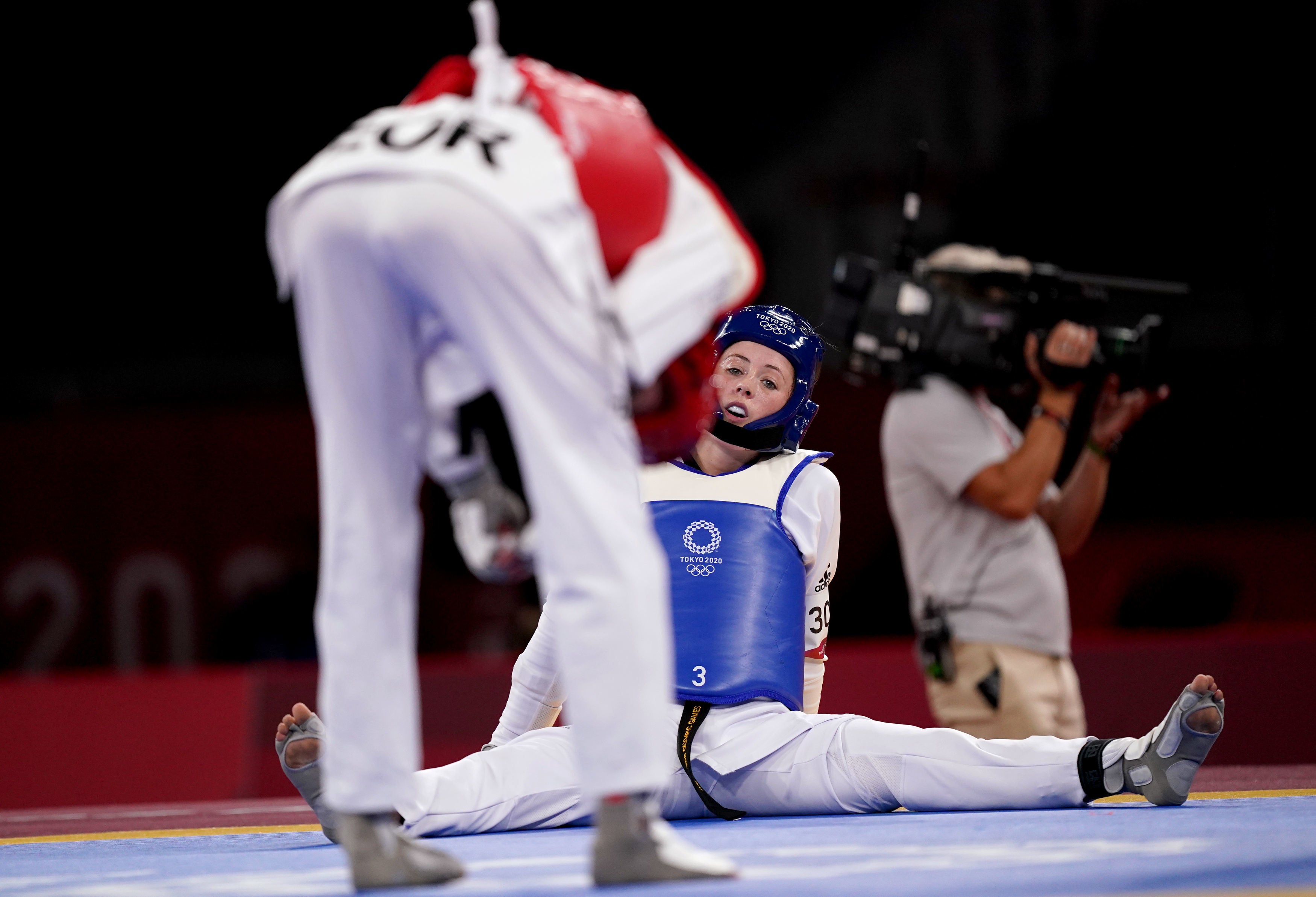 Jade Jones reacts as Kimia Alizadeh celebrates