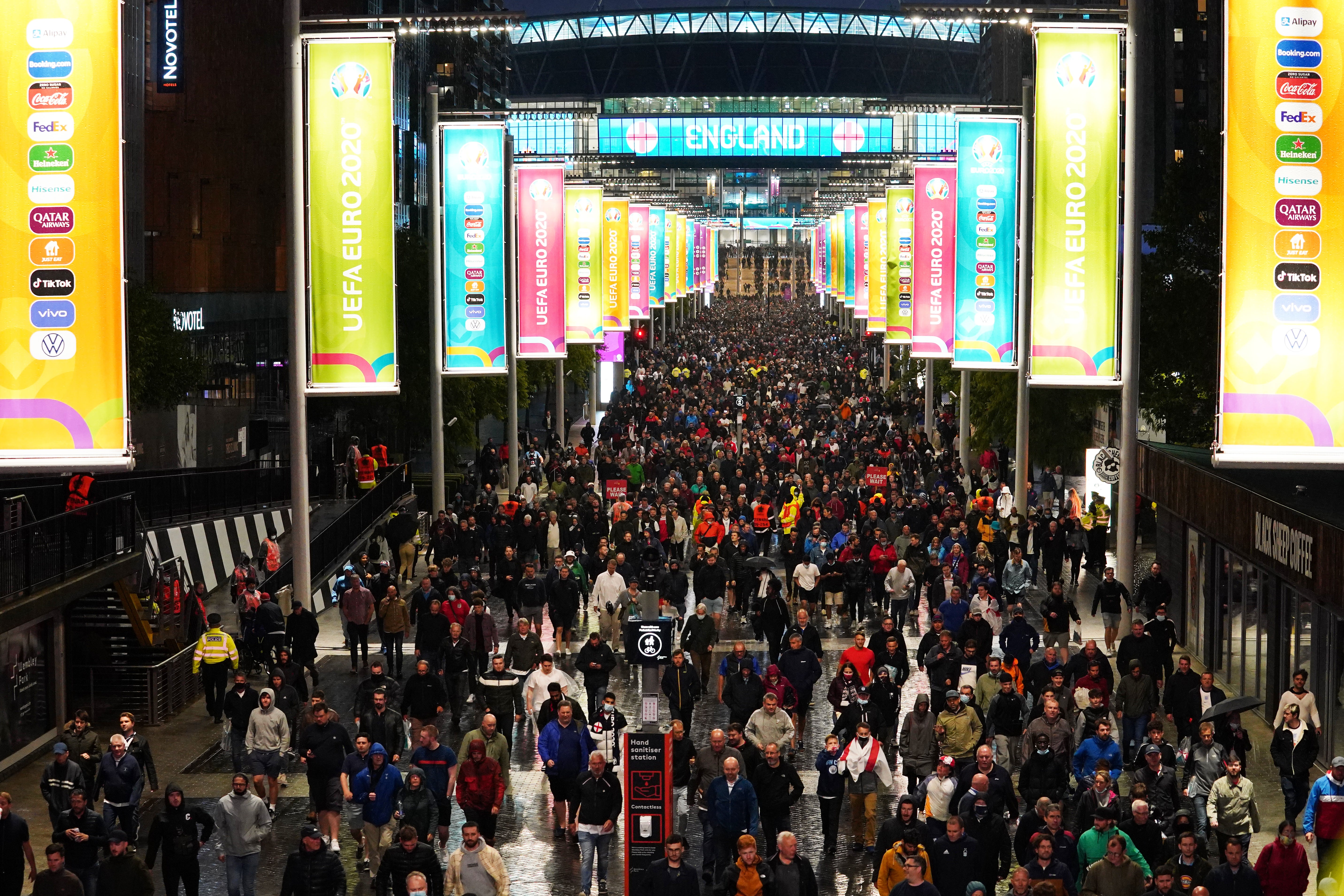 Fans outside Wembley Stadium after the Euro 2020 group match between England and Scotland (Aaron Chown/PA)