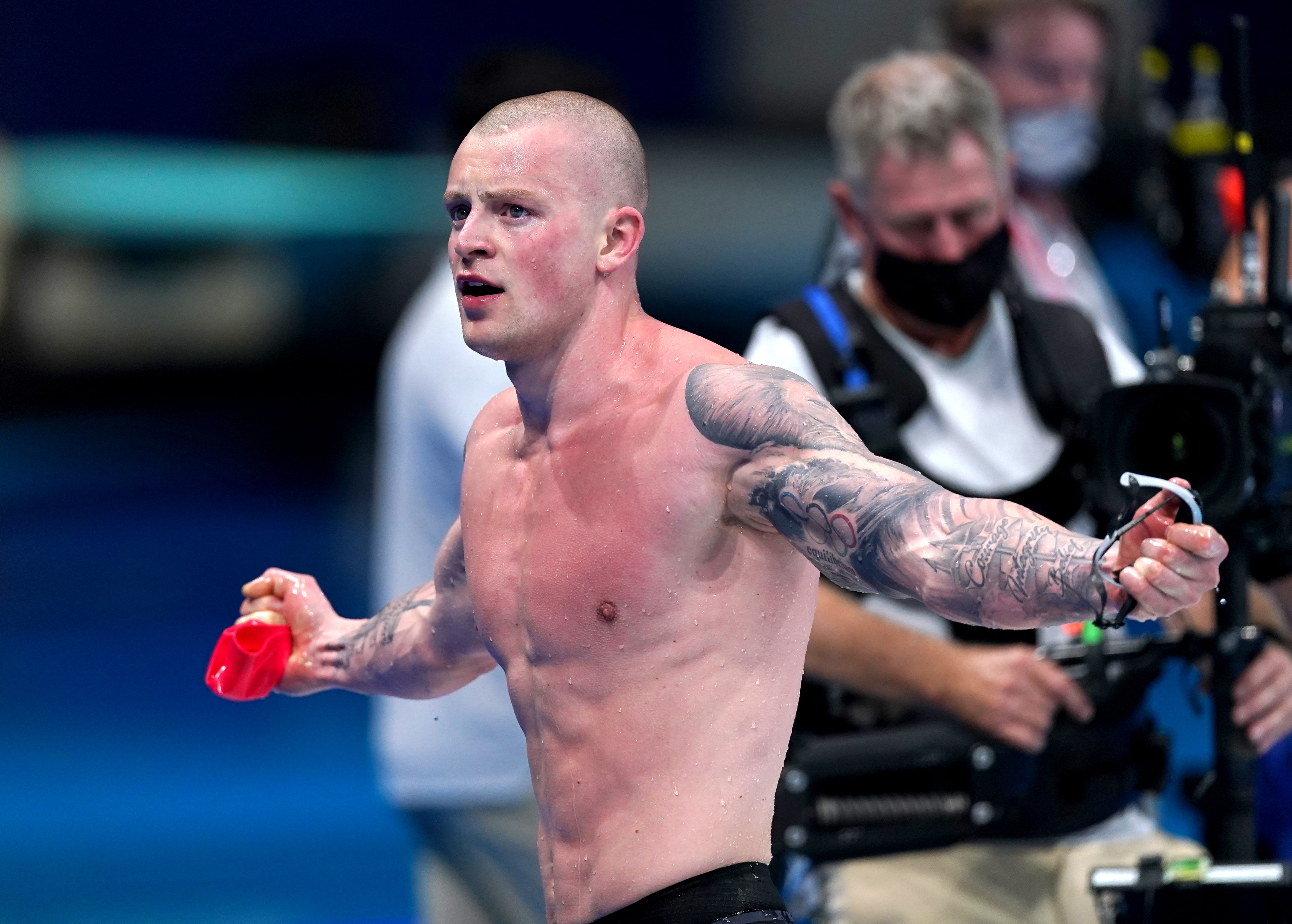 Adam Peaty celebrates his achievement (Adam Davy/PA)