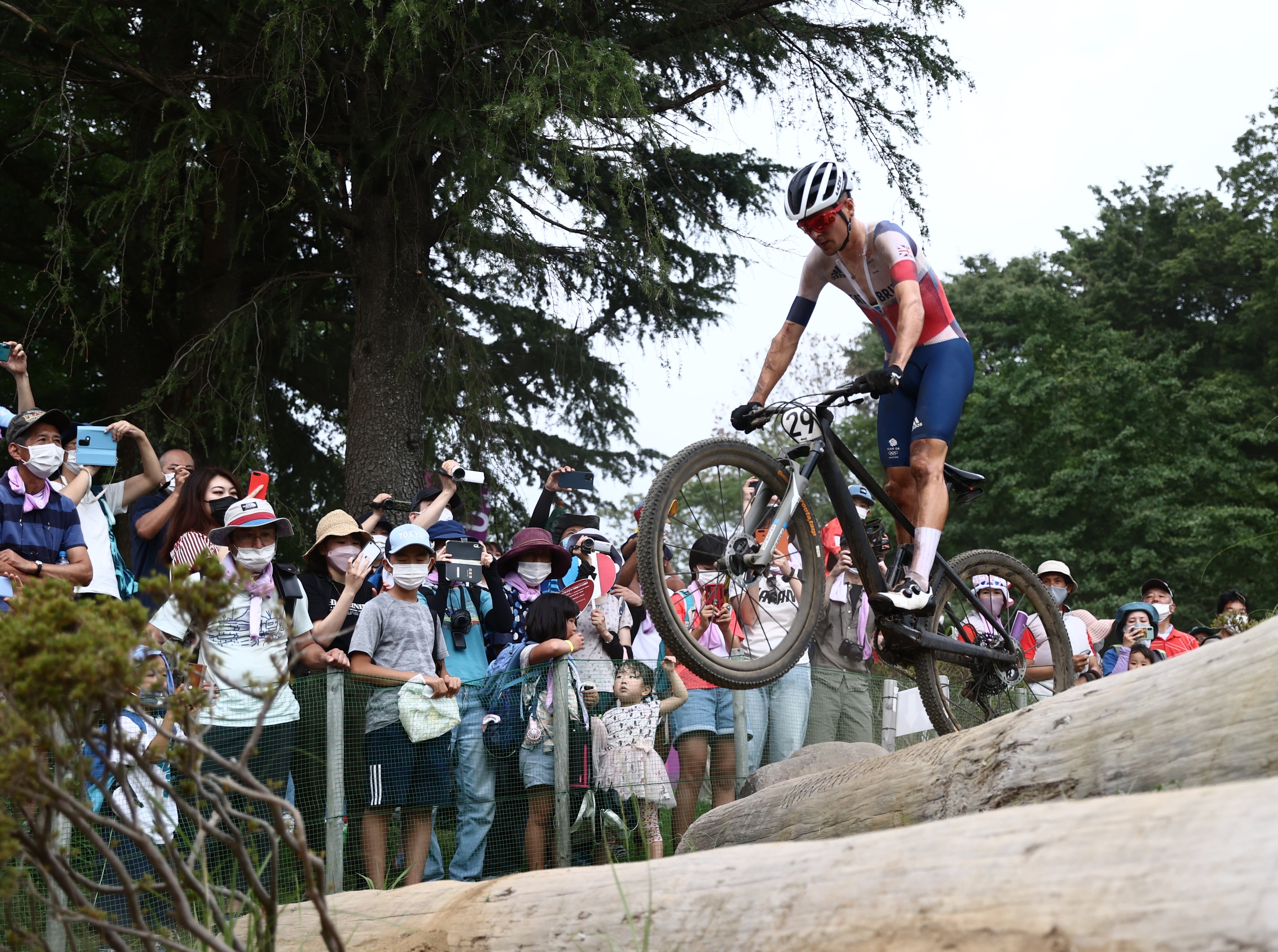 Tom Pidcock clears a jump