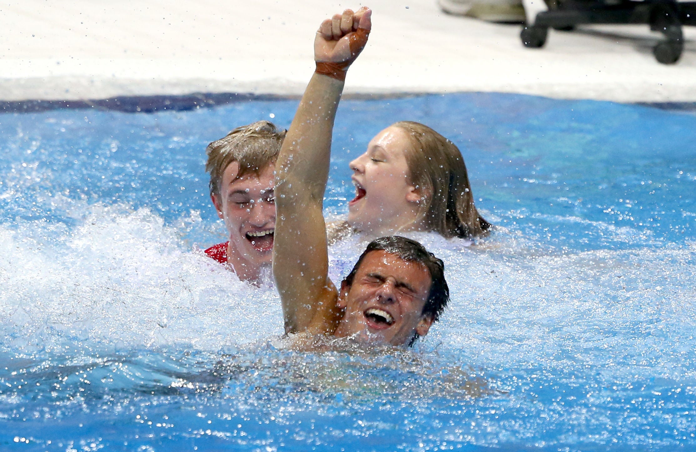 Tom Daley celebrates his bronze at London 2012 (Andrew Milligan/PA)