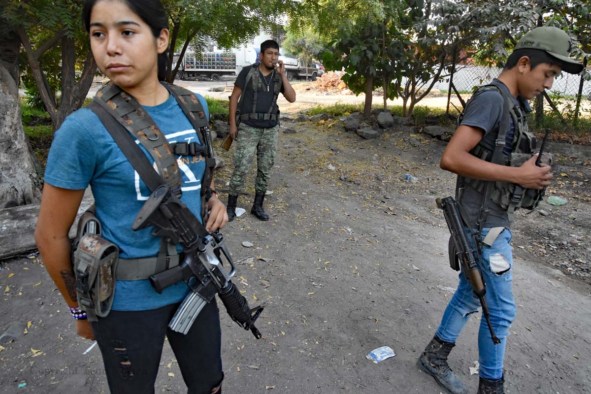 Defence militia: Los Viagras teenagers sporting AK47s and M16s