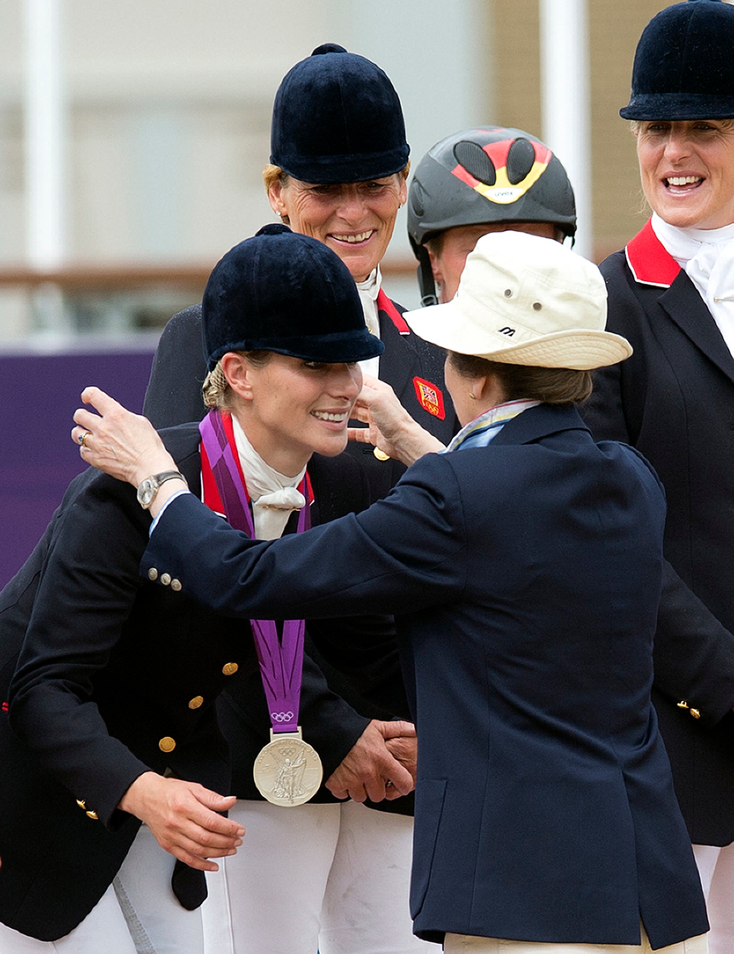 Princess Anne presents her daughter Zara with a silver medal