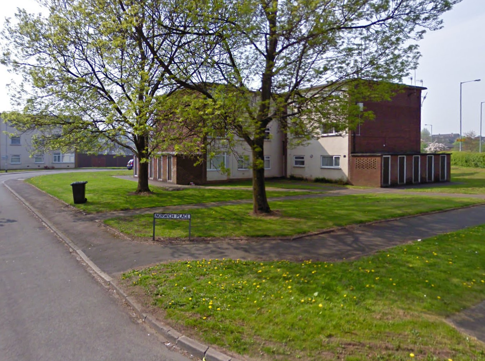 A block of flats in Norwich Place, Staffordshire, where Pawel Laszniewski’s body was found after three months