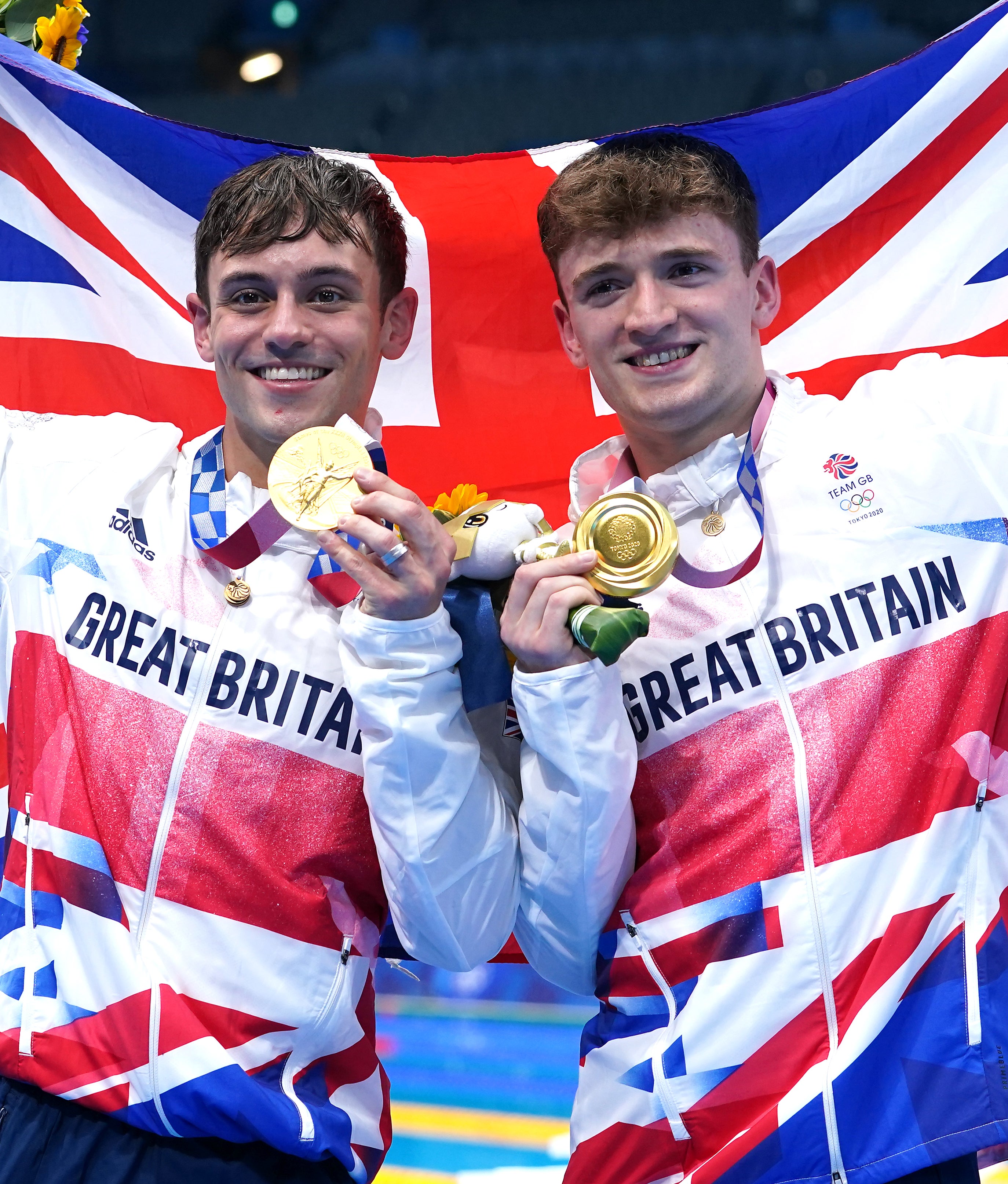 Tom Daley, left, and Matty Lee celebrate winning gold (Adam Davy/PA)