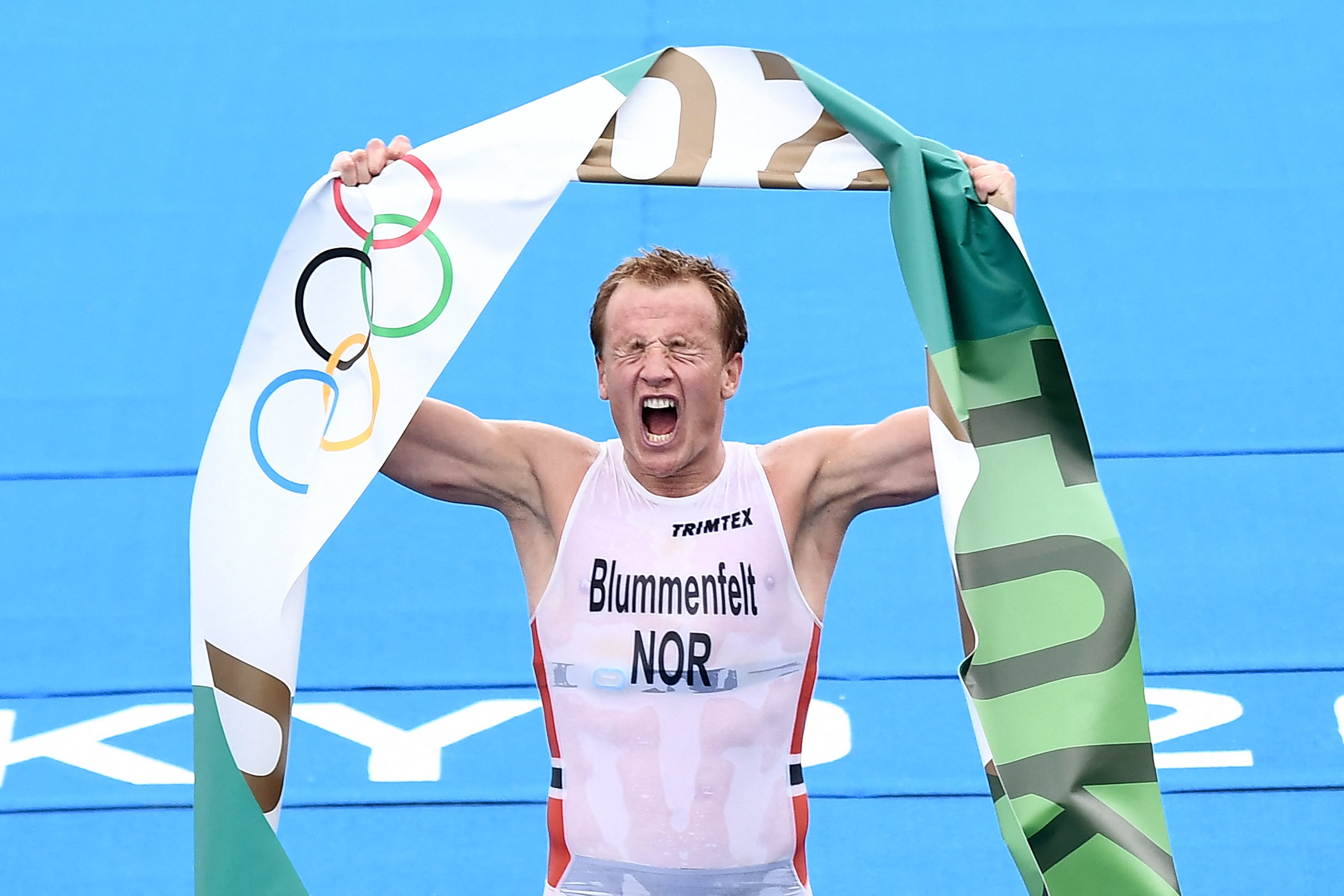 Norway's Kristian Blummenfelt celebrates at the Odaiba Marine Park in Tokyo