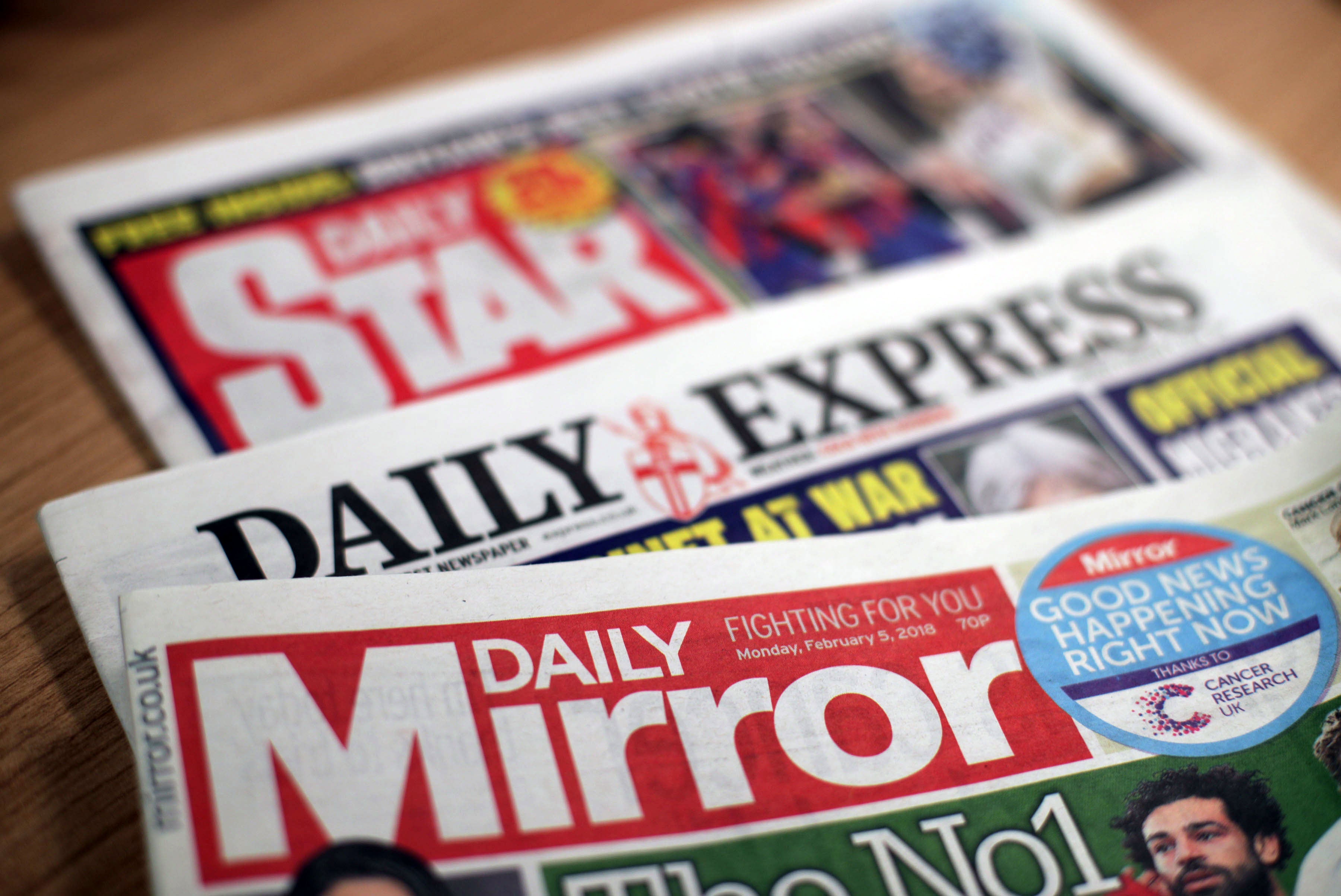 The Daily Mirror, Daily Star and Daily Express owner Reach has posted rebounding sales over the past half-year (Yui Mok/PA)