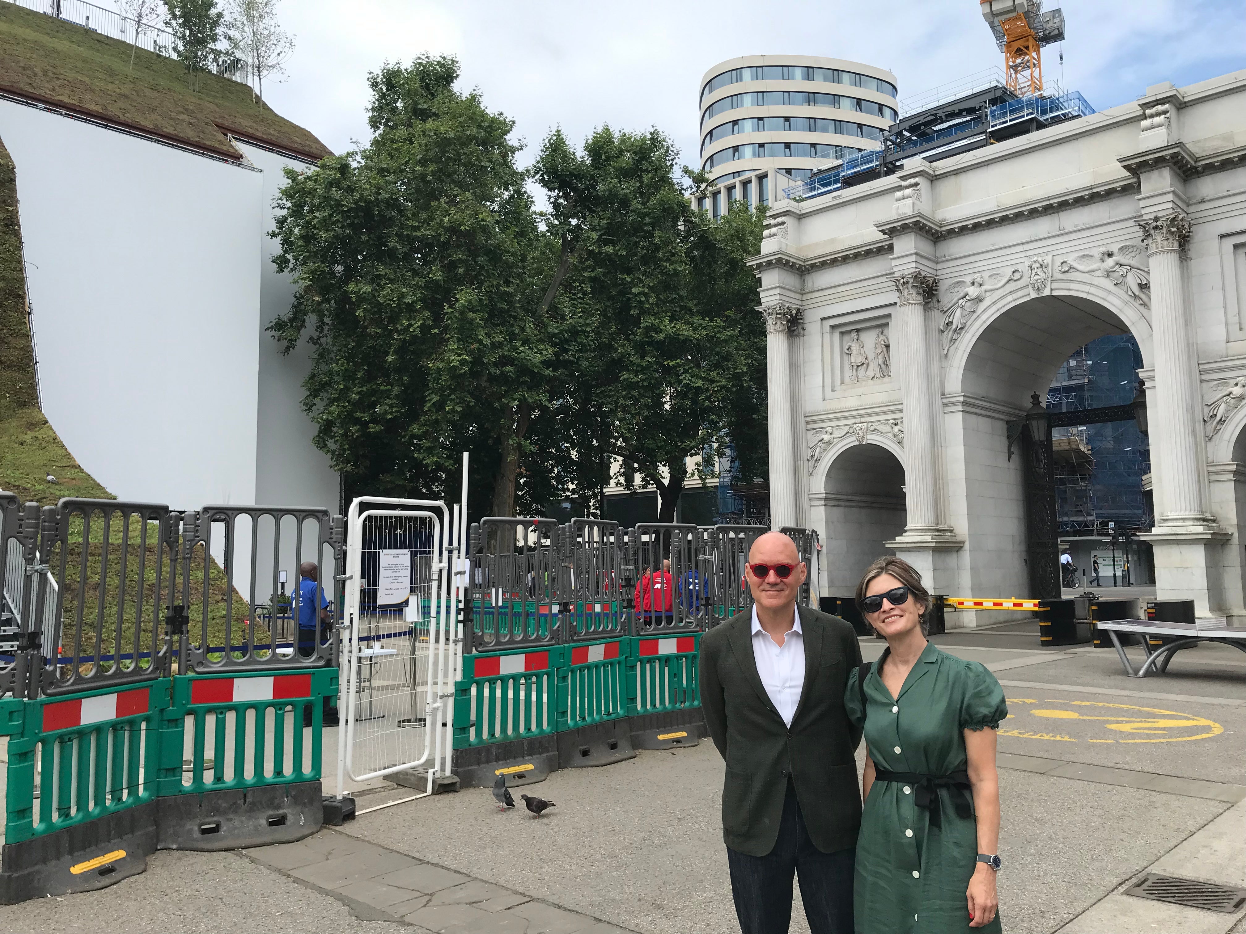 Chris Choa and Sarah Elson stand close to Marble Arch and its neighbouring mound