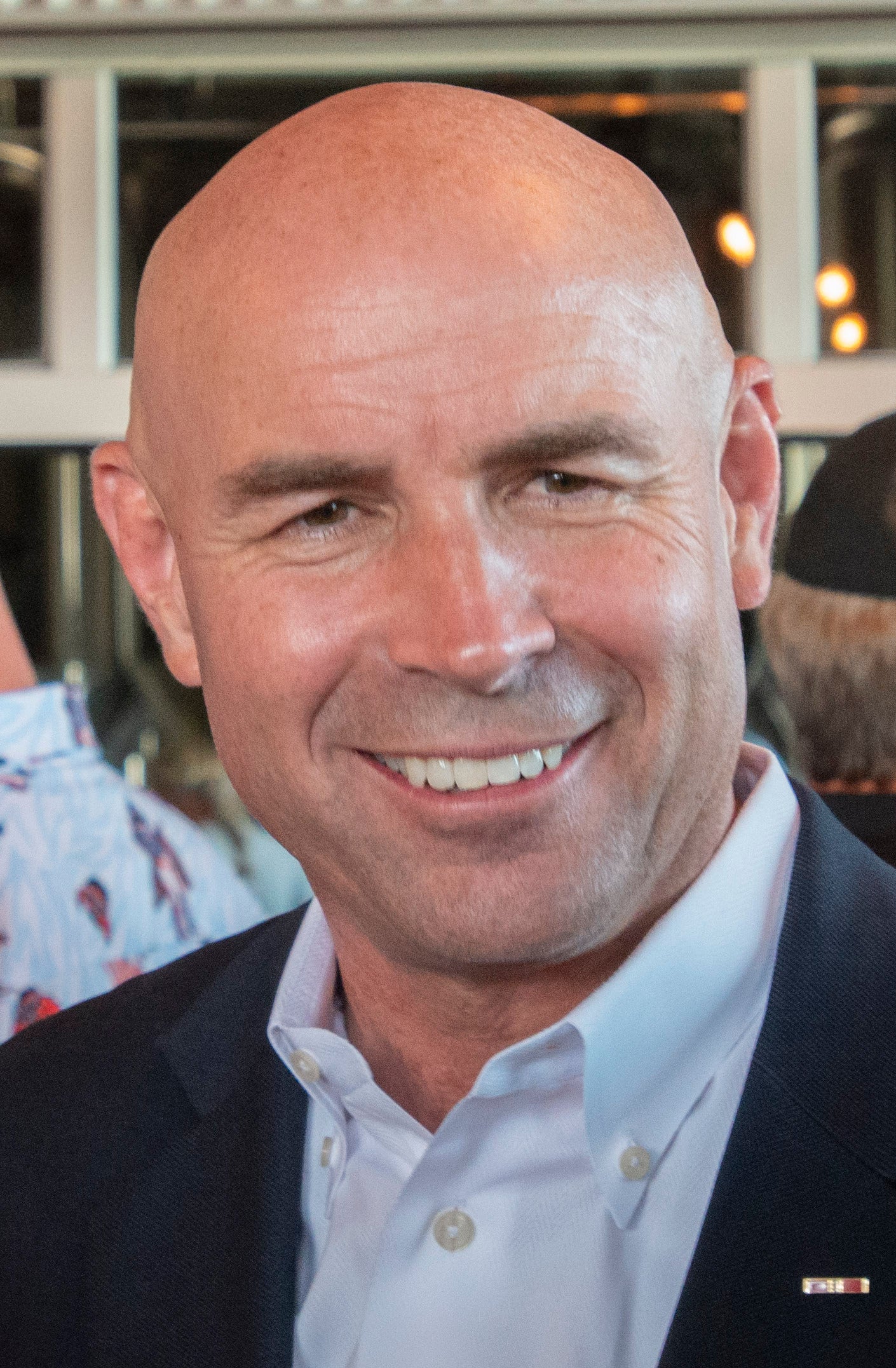 File: Jake Ellzey talks with supporters during an evening fundraiser at Legal Draft in Arlington on 14 July 2021