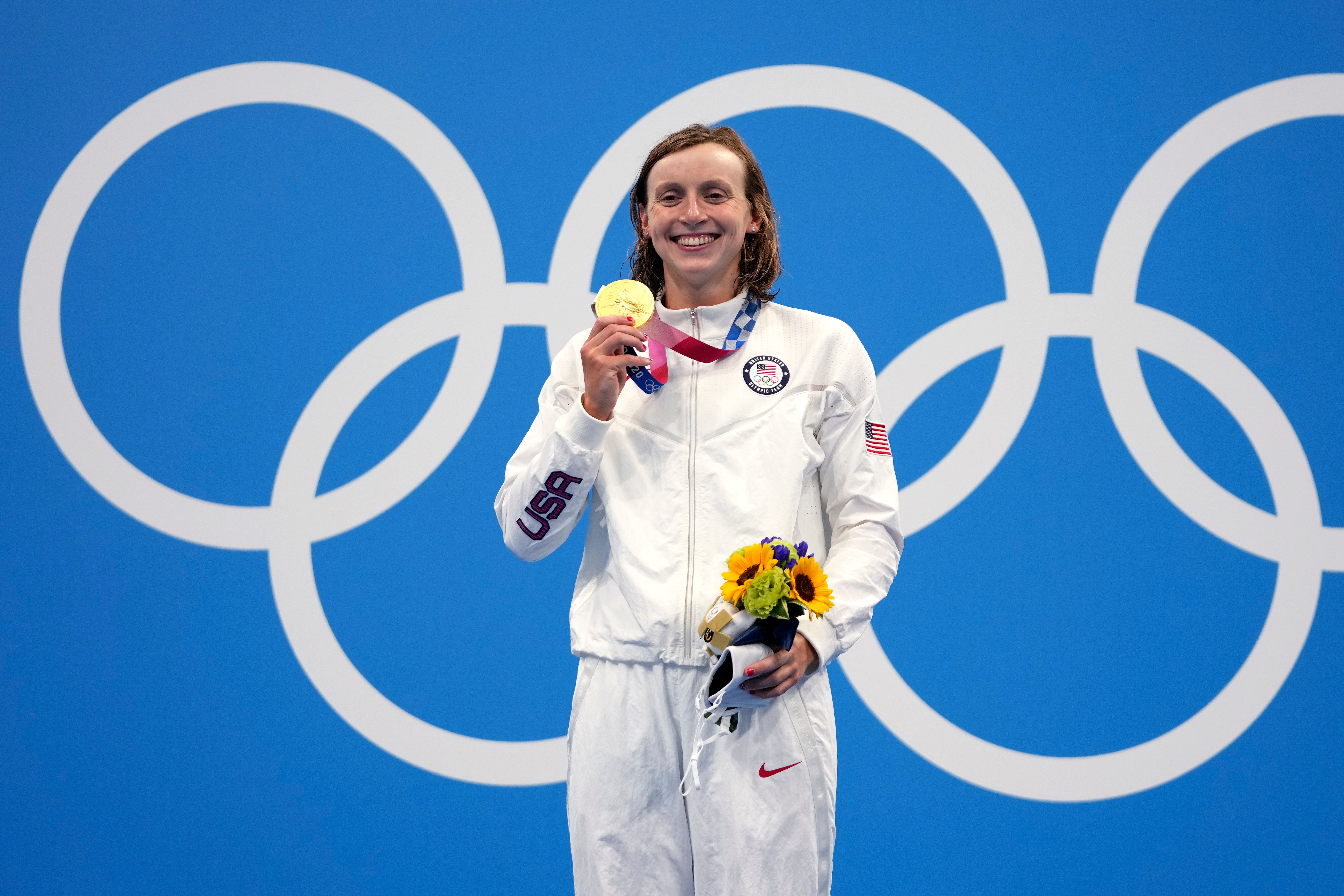 Katie Ledecky celebrates winning 1500m gold