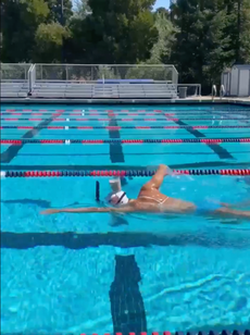 Katie Ledecky’s training included swimming with a glass of chocolate milk on her head