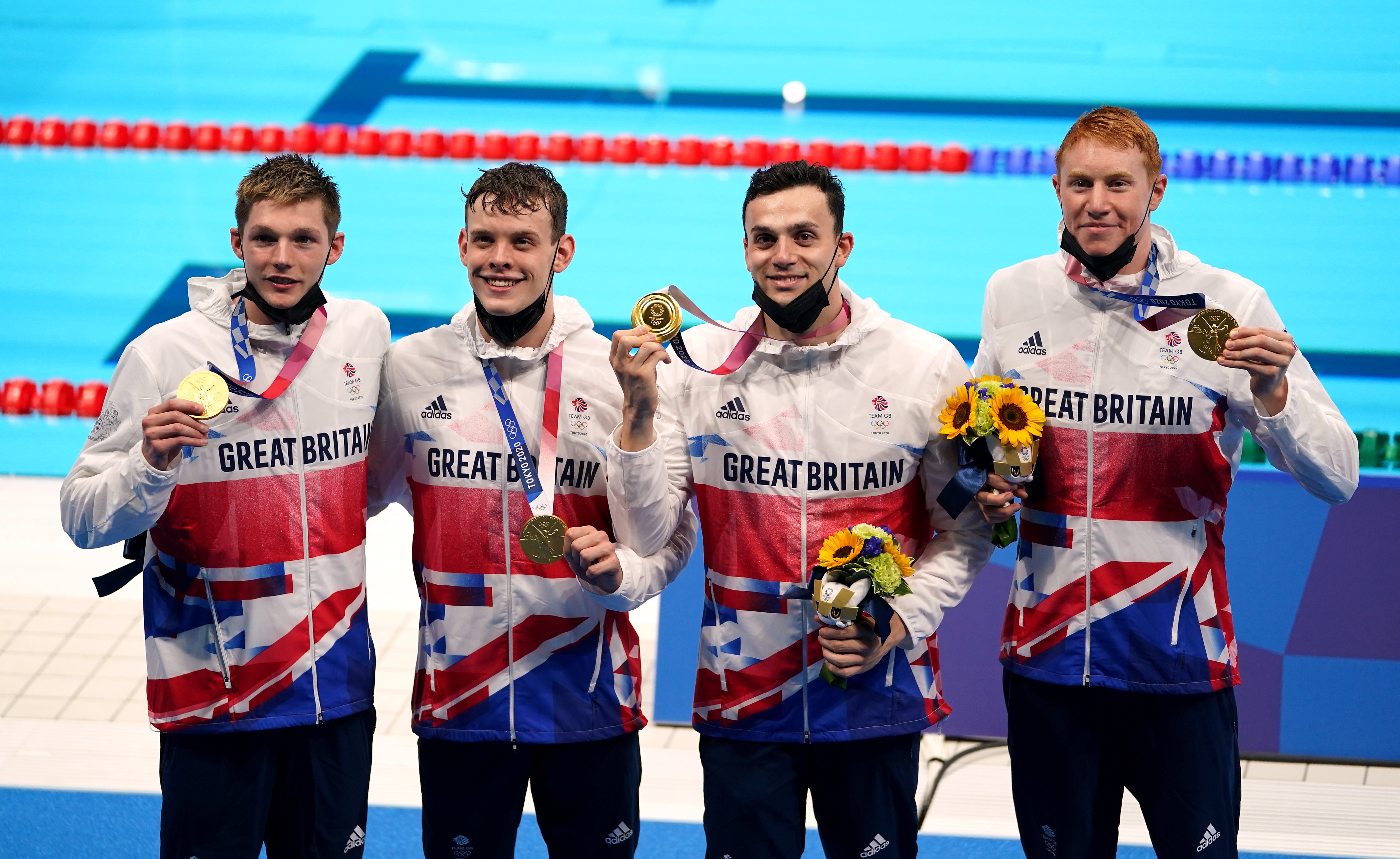 Dean, right, was part of the men’s 4x200m freestyle relay that won gold for Team GB (Joe Giddens/PA)